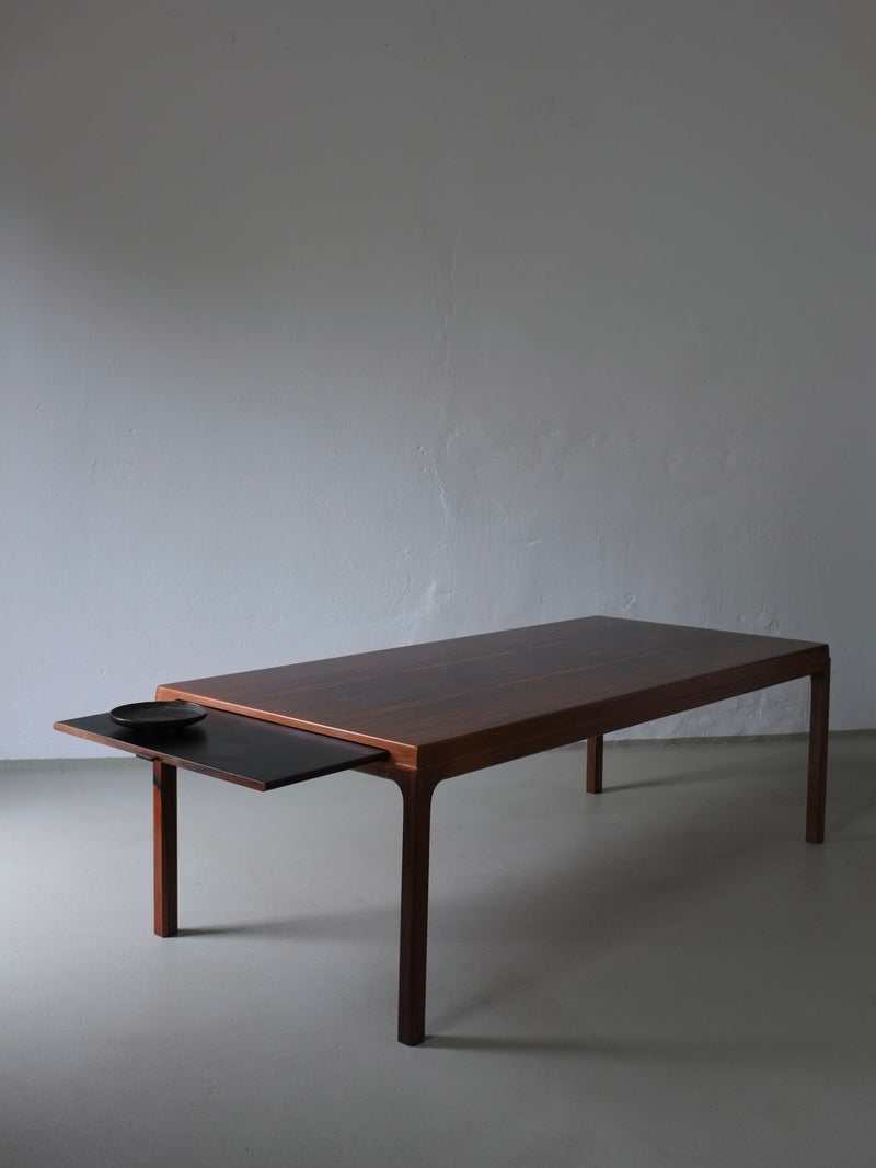 Johannes Andersen rosewood coffee table with black sliding tray