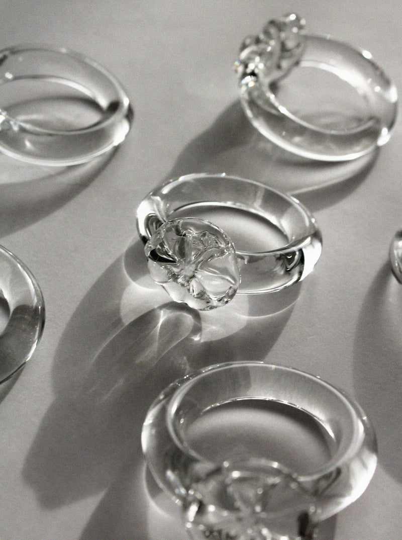Close-up detail of vintage glass napkin rings with crystal clarity