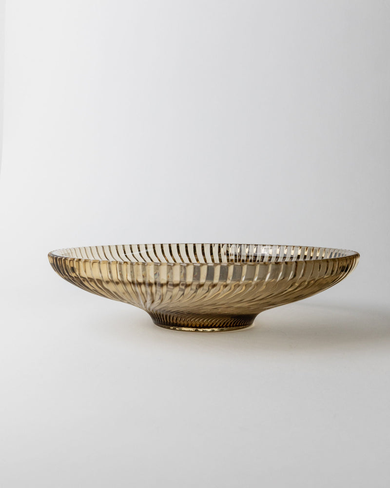 Amber smoked glass bowl profile view showing ribbed texture