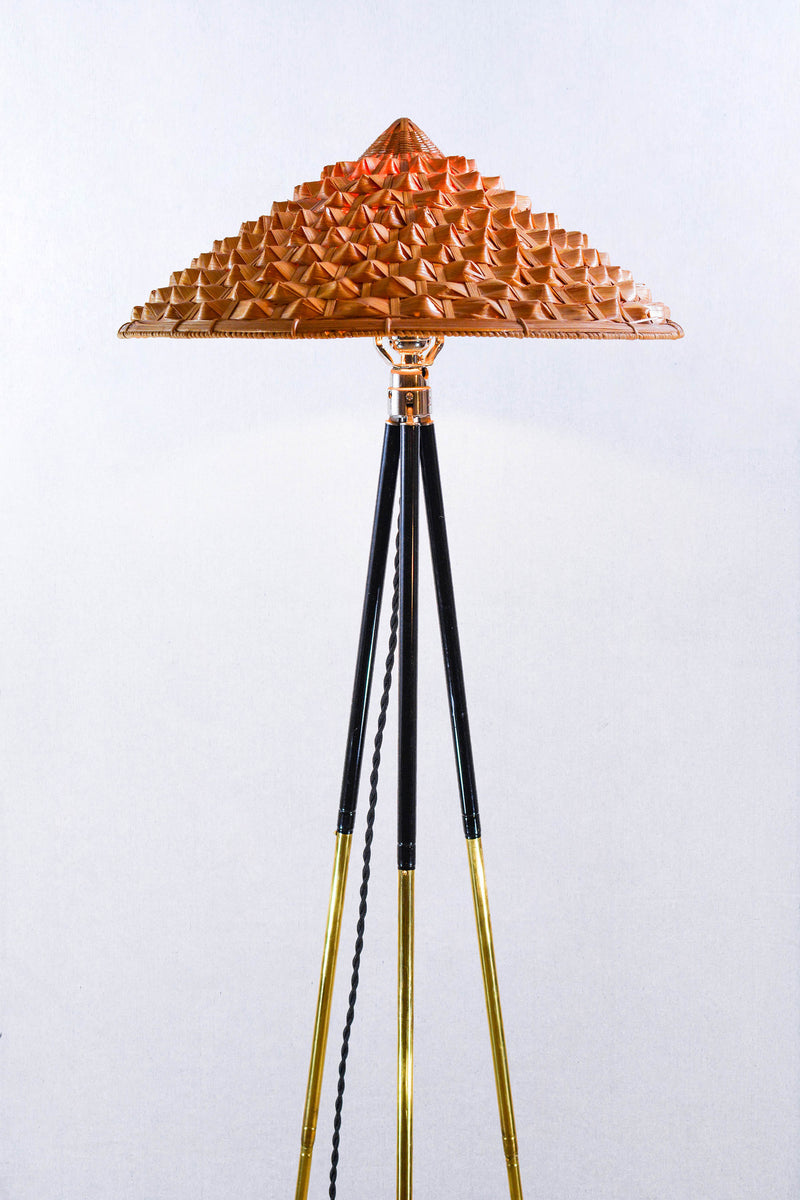 Horst copper pyramid lampshade floor lamp on black tripod legs