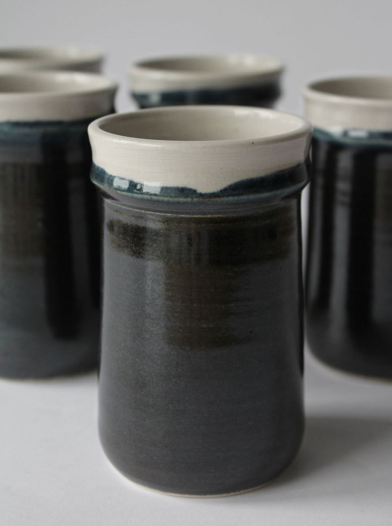 Set of Finnish ceramic tumblers with teal and charcoal glazing