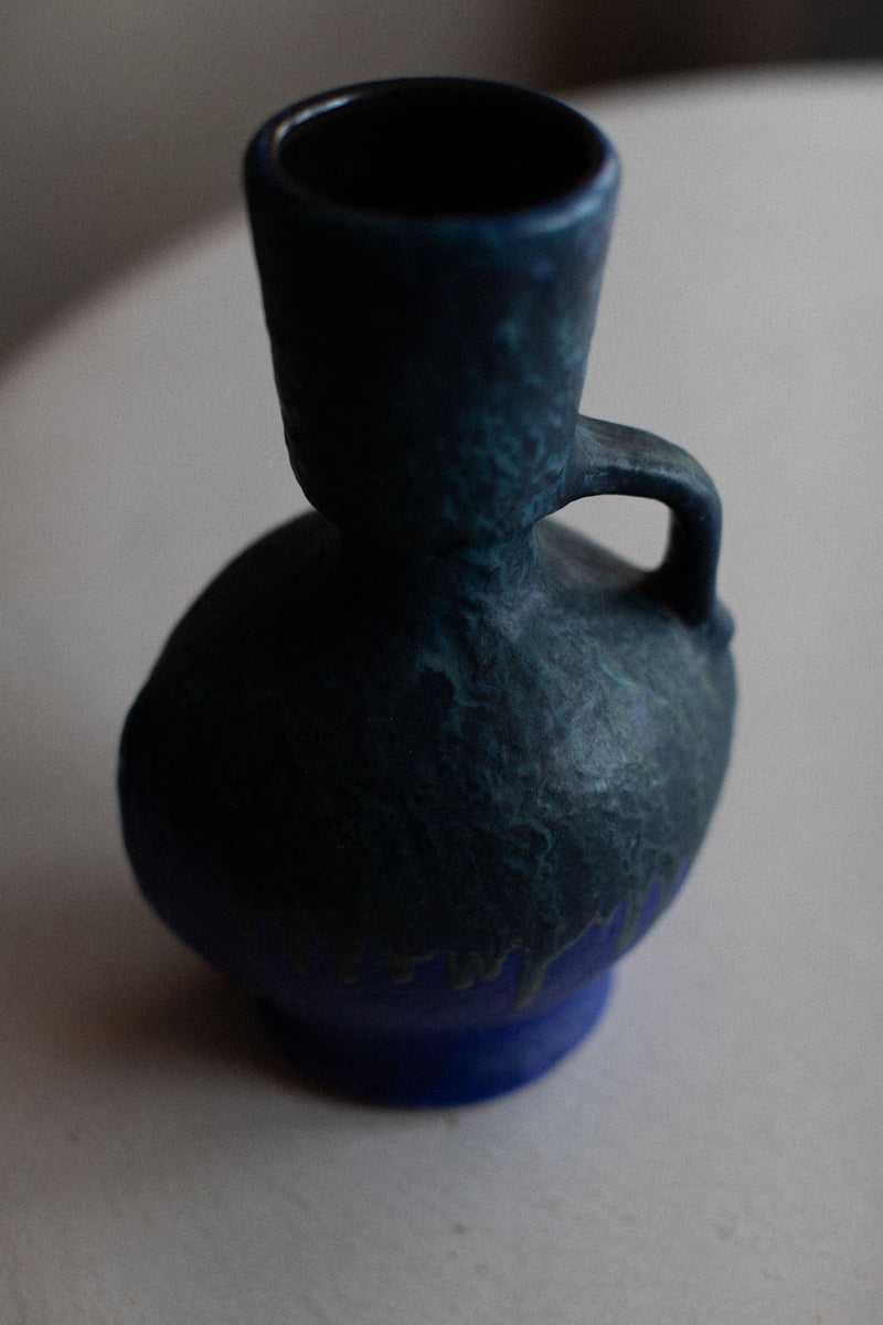 Antique ceramic vase with crackled finish and unique shape