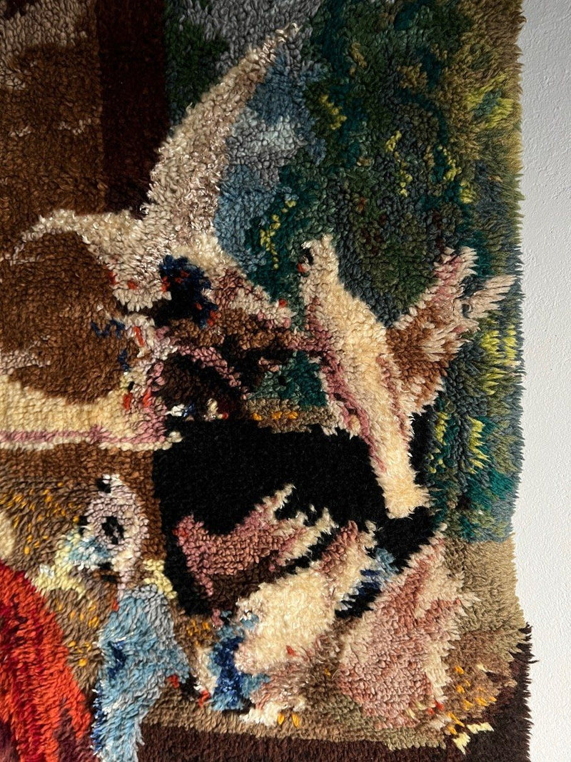 Close-up detail of textured wool wall hanging with abstract pattern