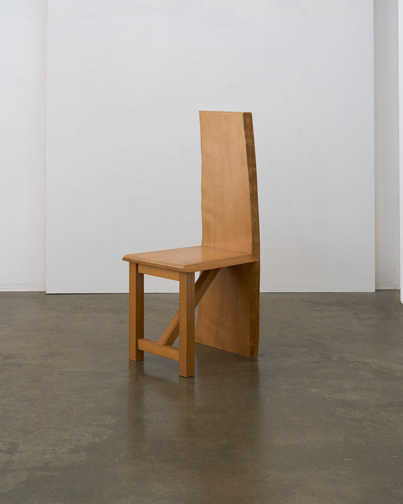 Postmodern oak high back chair profile view showing geometric design