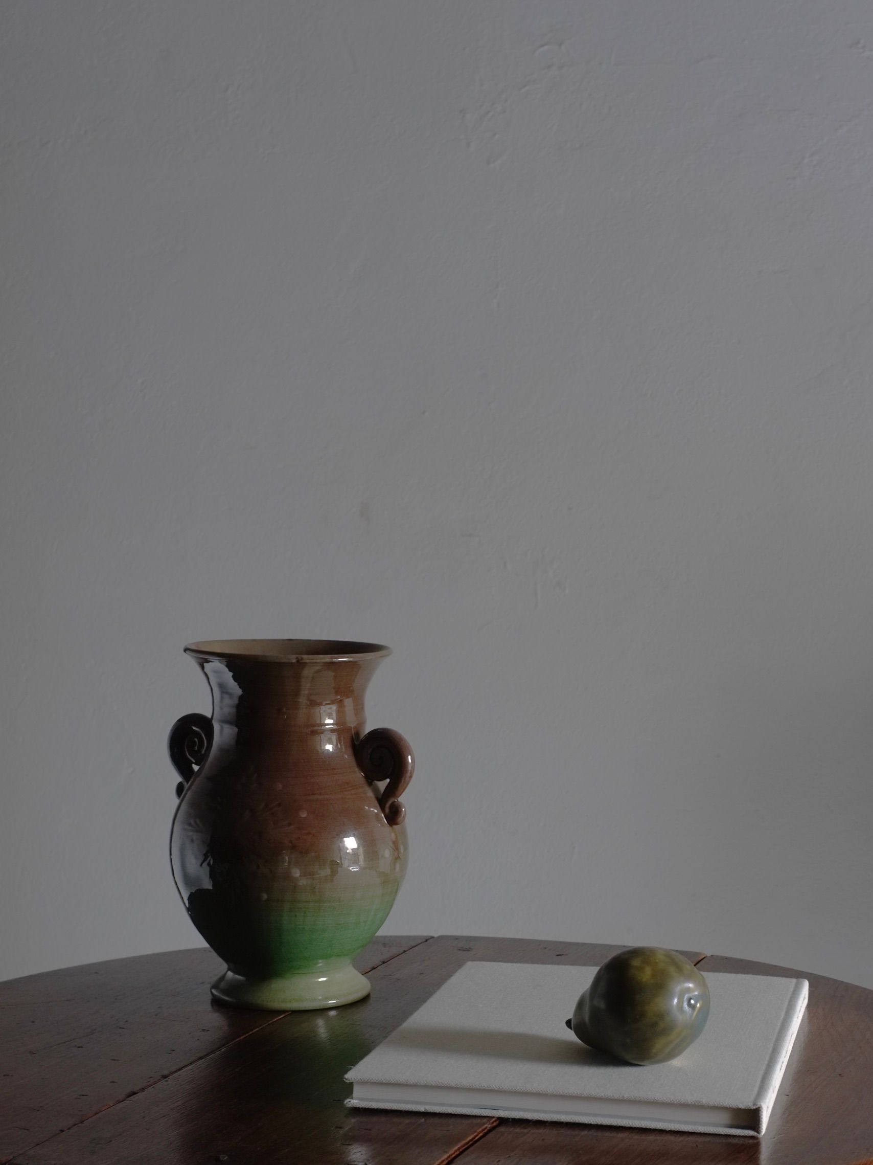Large Green Ceramic Vase, Latvia, 1960s — side angle on wooden table