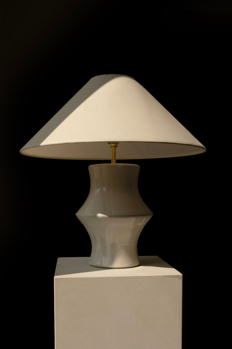 Suzanne ceramic table lamp with conical shade by Landy Rakoto