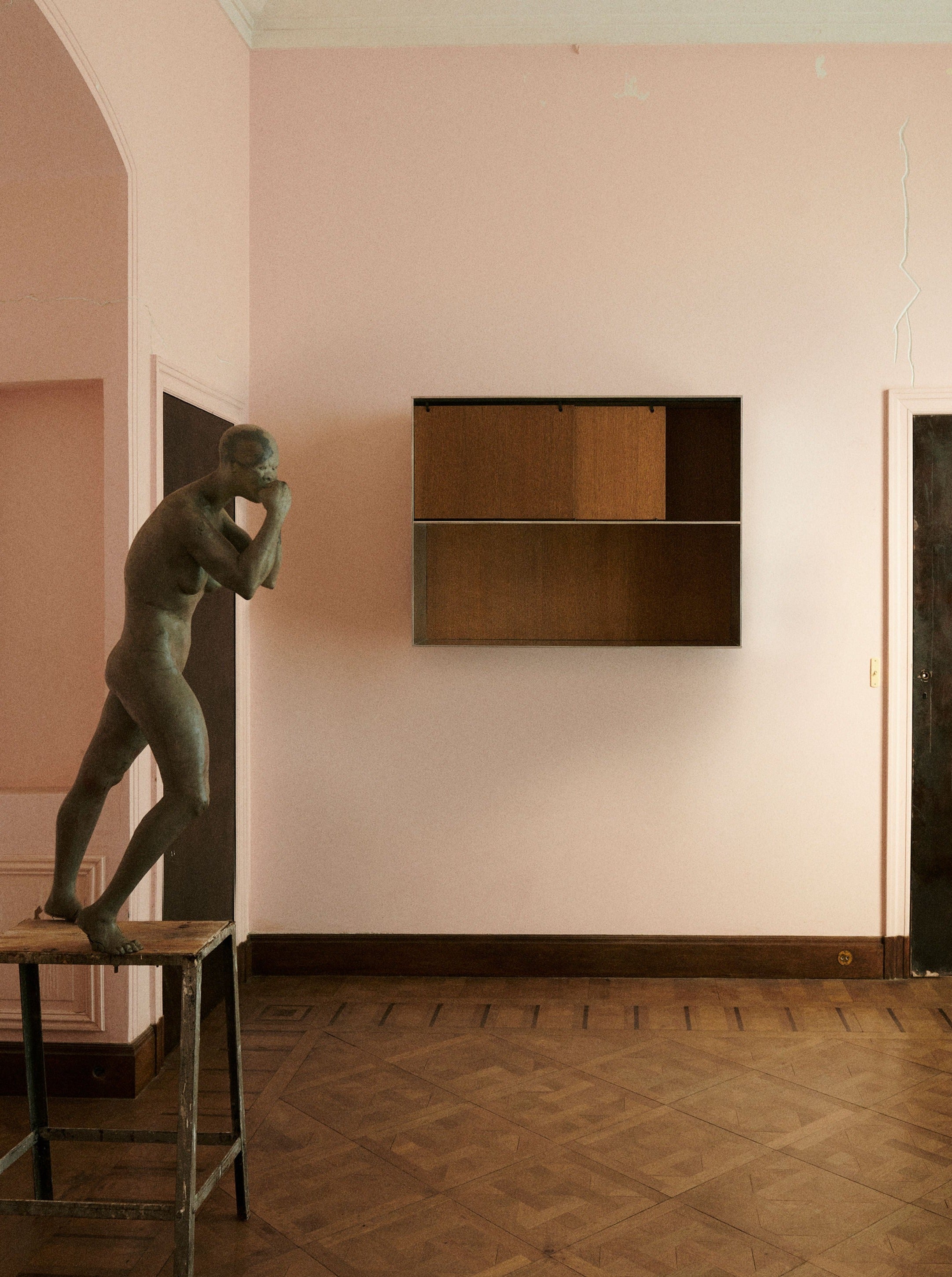 Aluminium and plywood wall cabinet with adjustable shelves and sleek design