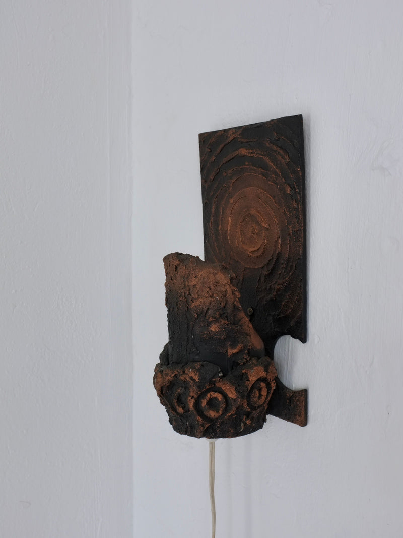 Brutalist ceramic wall sconce by Jouko Kytömaa with textured surface