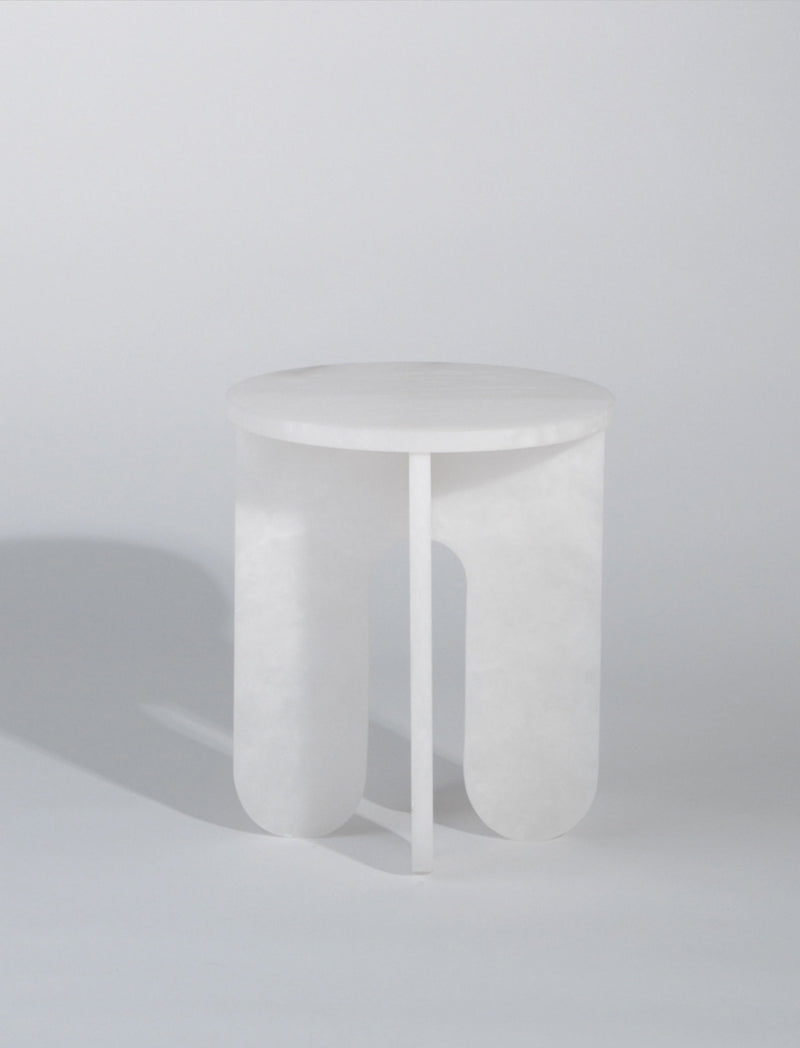 Modern alabaster side table with cylindrical legs and round top