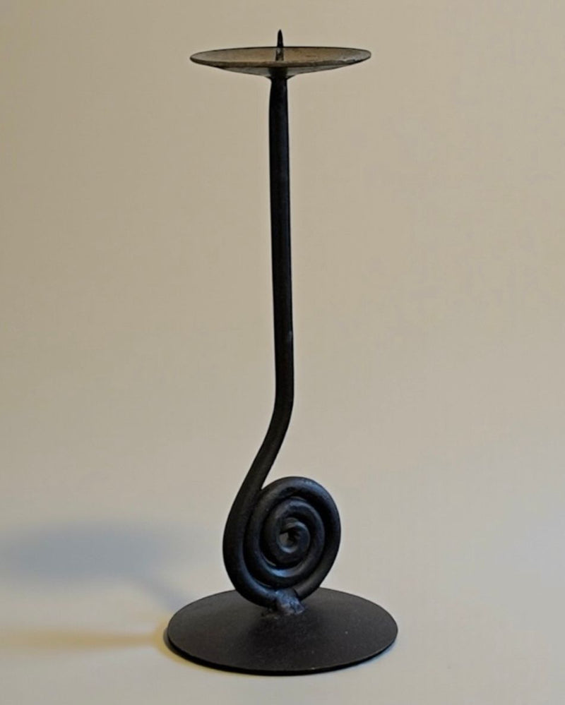 Black iron candle holder with elegant spiral base design