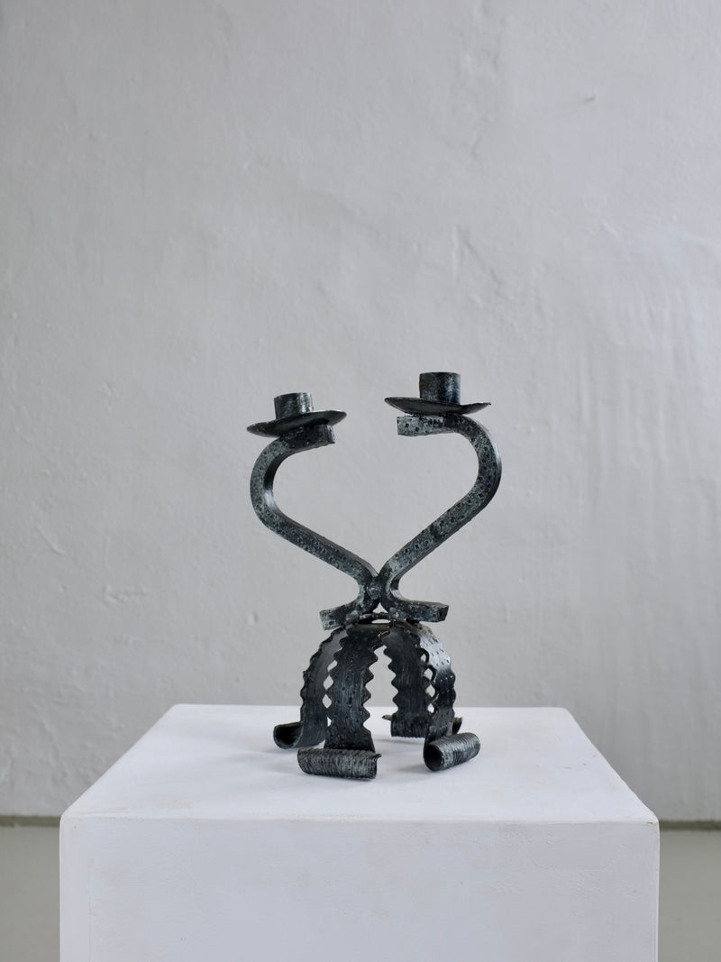 Brutalist iron candle holder with heart-shaped sculptural design