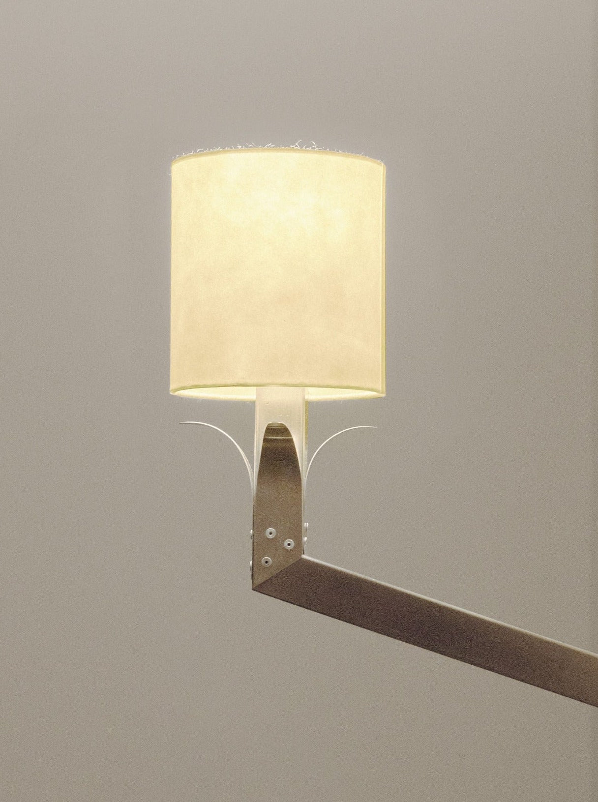 Modern stainless steel wall lamp with sleek design and adjustable light