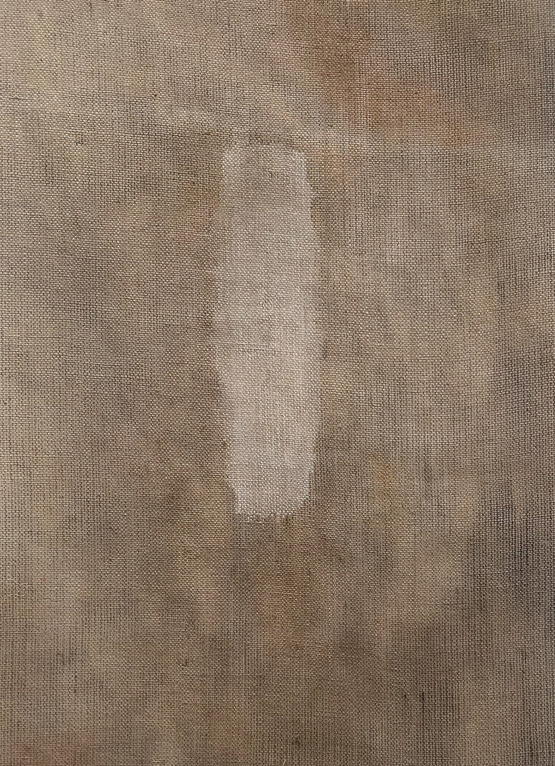 The Moontide fabric by Sundance Studio mimics Yaegl Country's wide open spaces with a central pale patch. Its aged, worn look and visible weave evoke the natural beauty and history of Yuraygir National Park's landscapes.