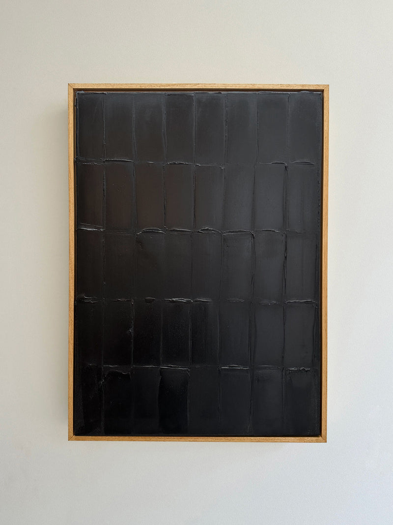 Abstract black textured painting with grid pattern by Roi Elmaliah