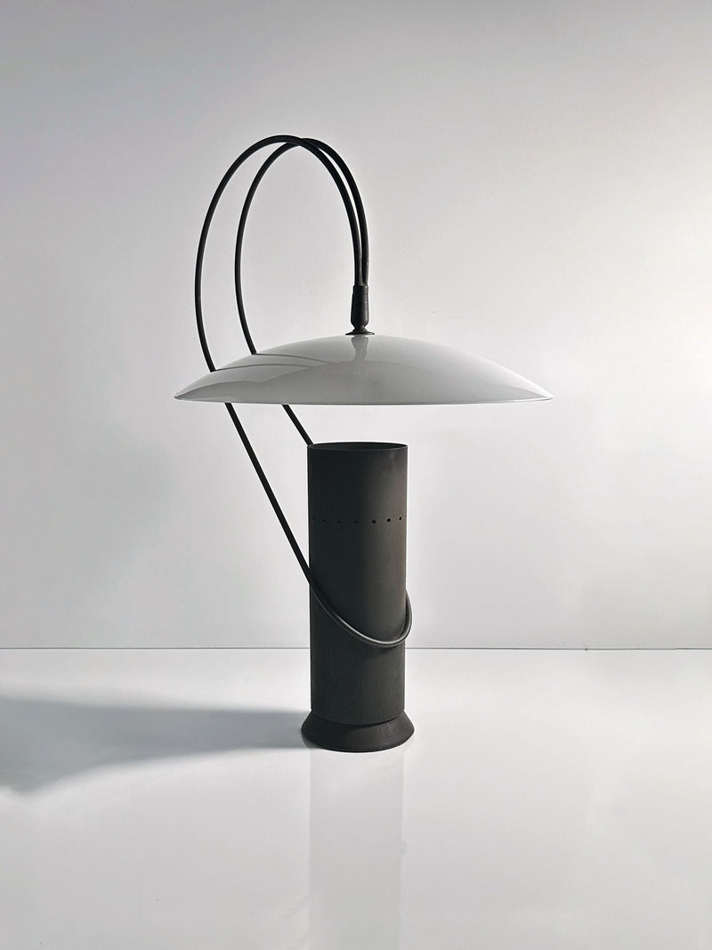 Cast iron table lamp with white shade and curved handle by Enzo Berti