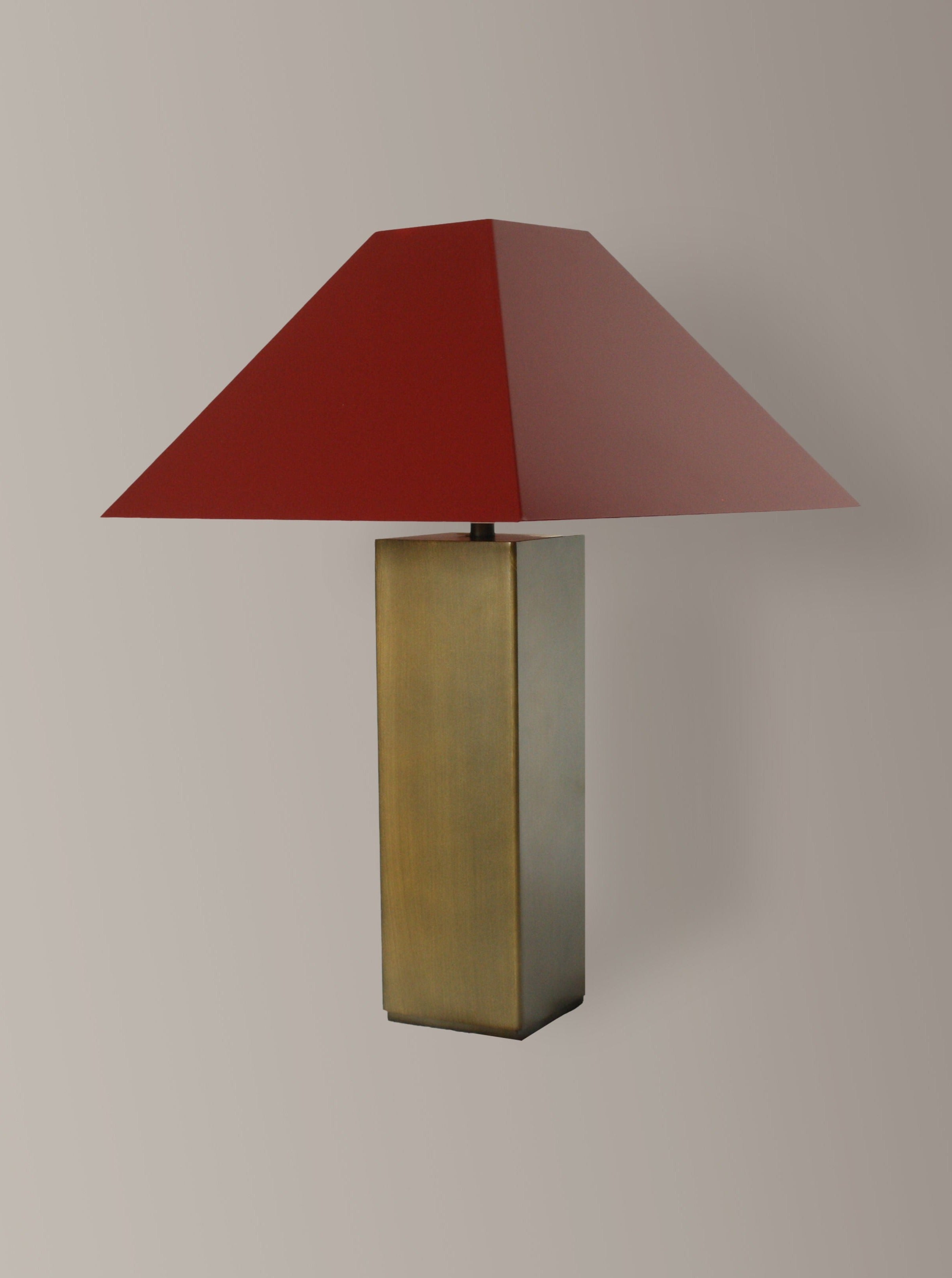 Anni Lamp — side angle showing brass base and red shade