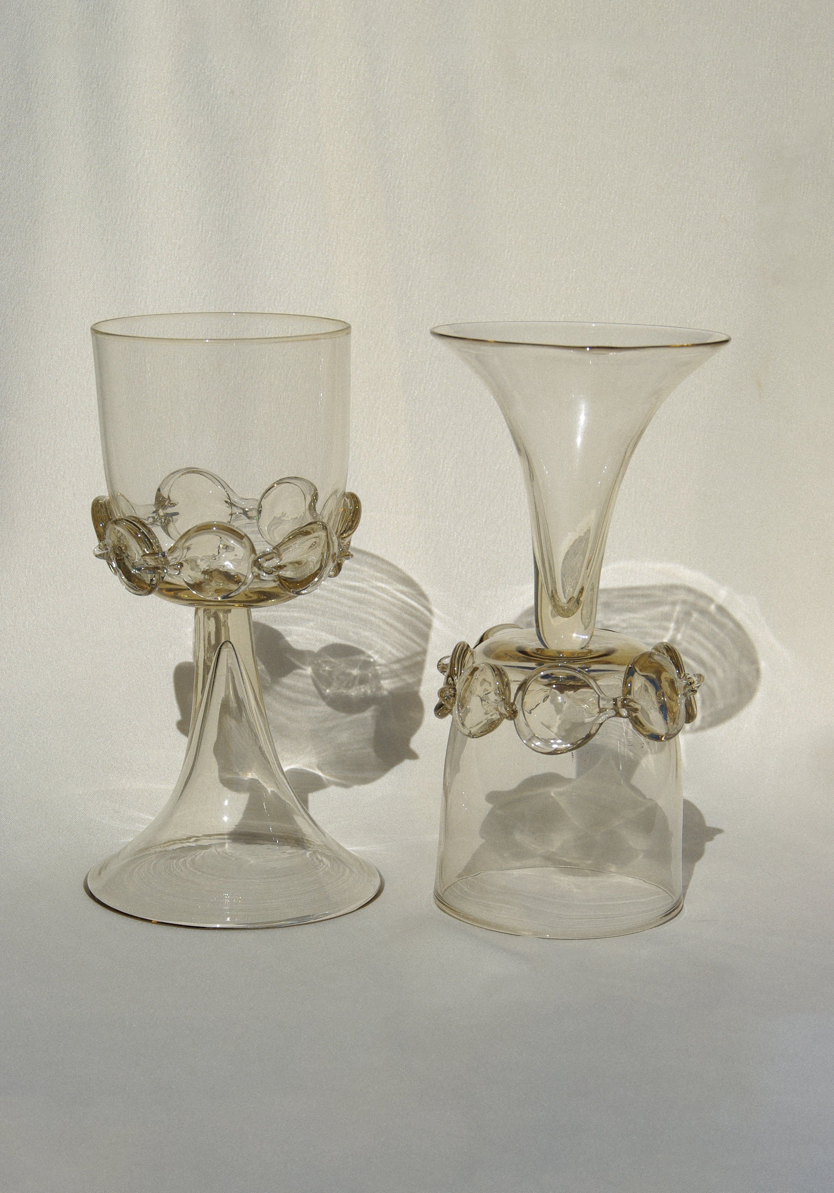 Pair of Mouthblown Wine Goblets - Chain — close-up of glass with decorative beads