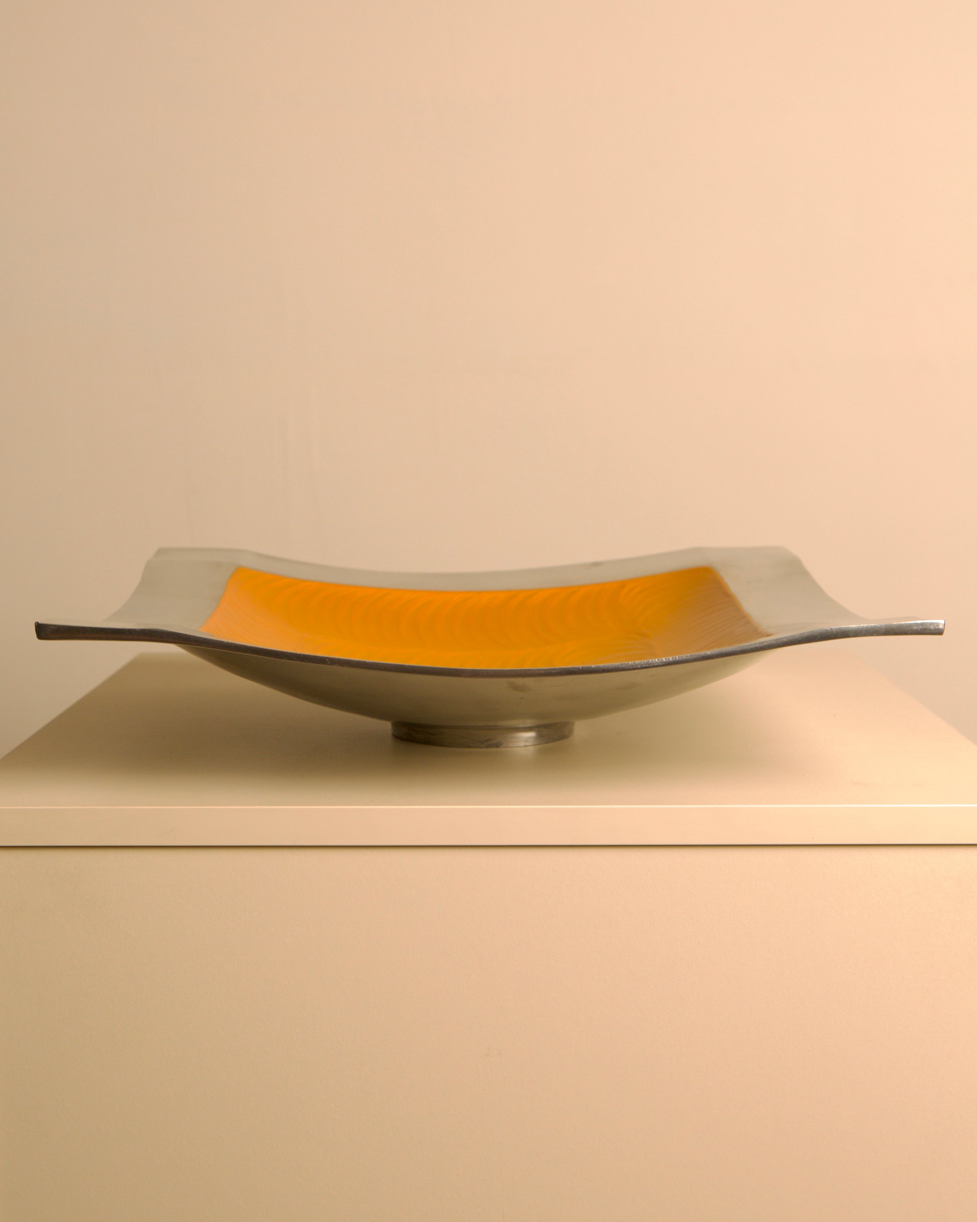 "Galassia" aluminum dish, orange center, Brandani, Italy, 1980s — detail view