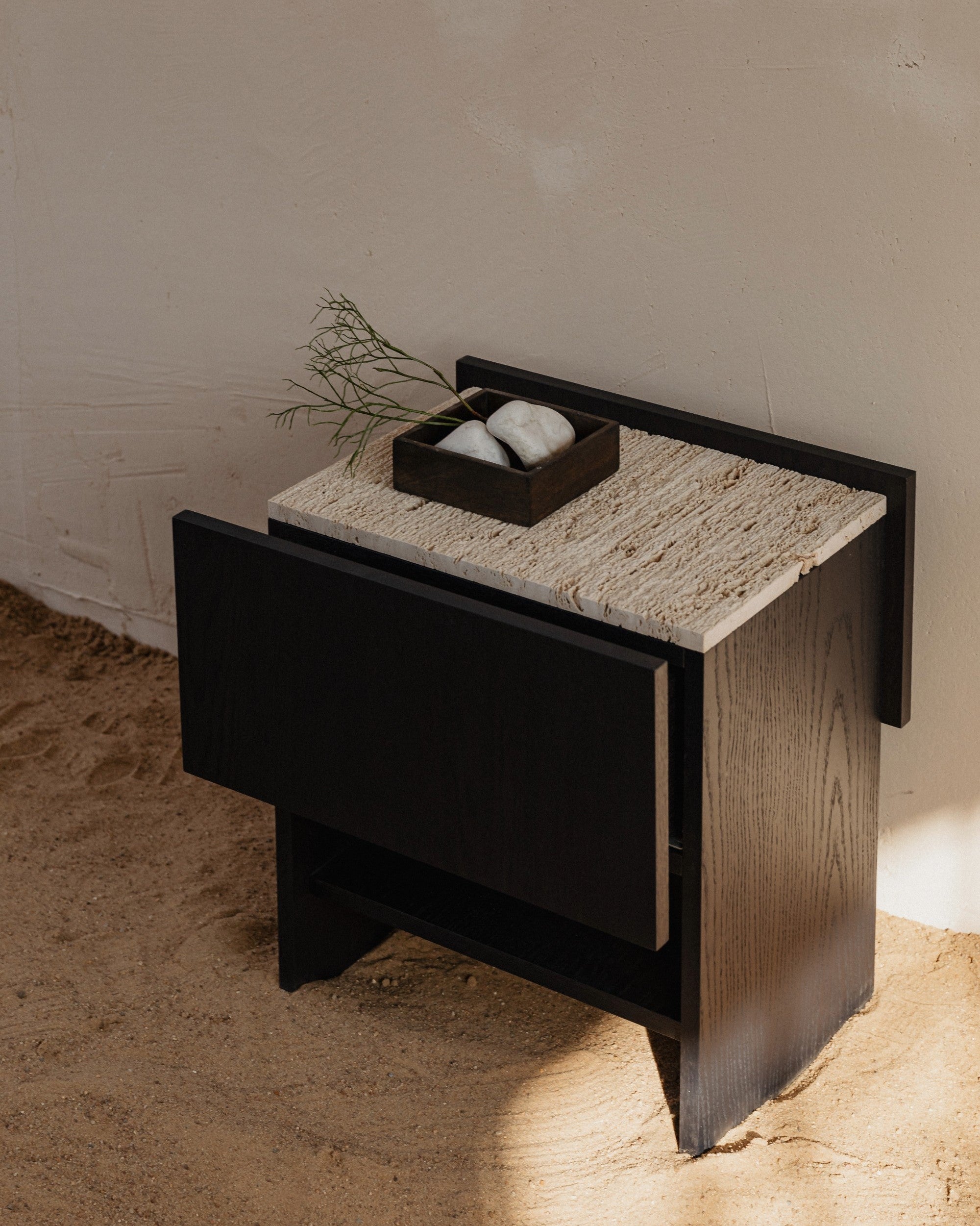 NOTO nightstand with woven rope seat and black metal frame detail