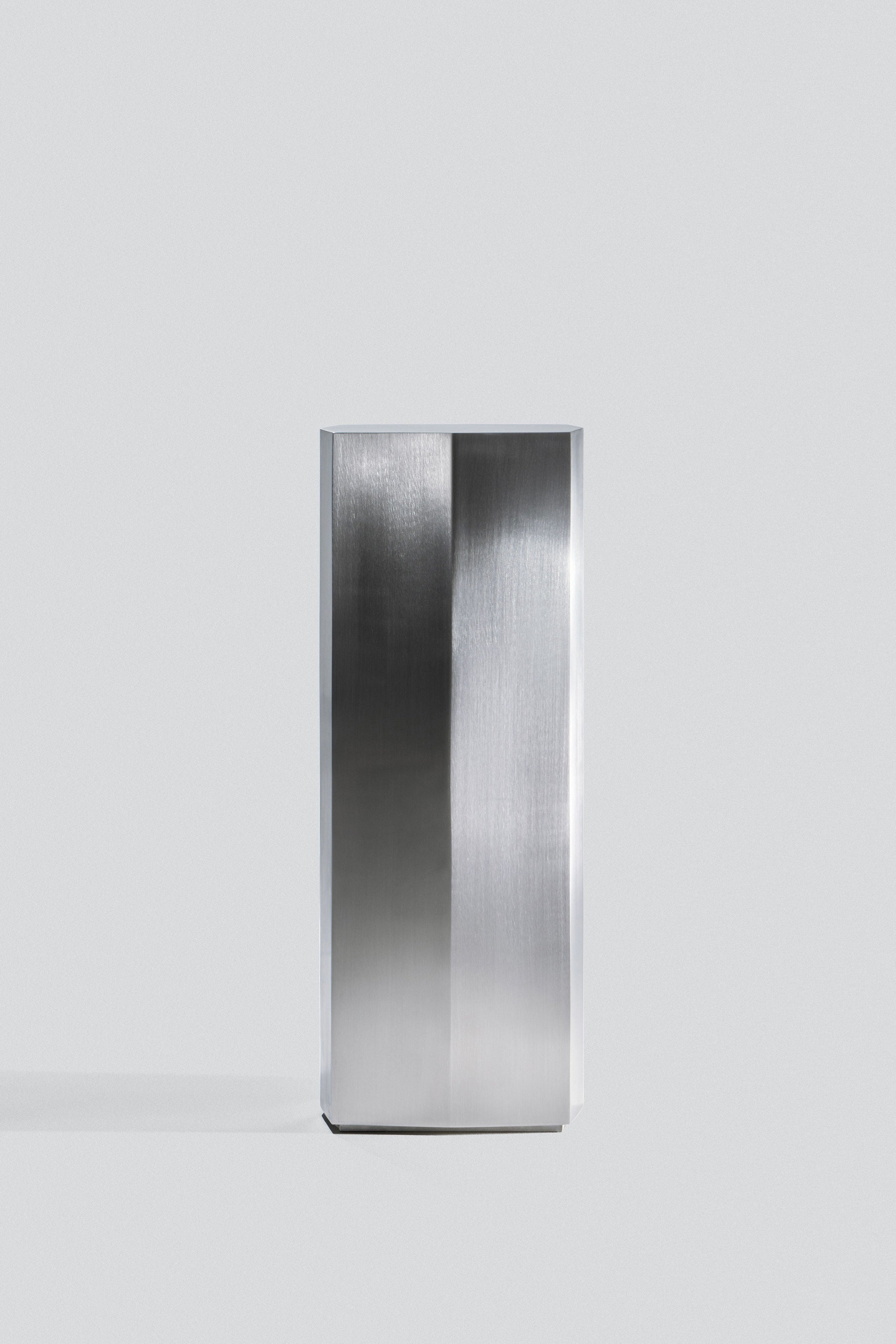 Ame II' Steel Pedestal — side view highlighting brushed steel finish