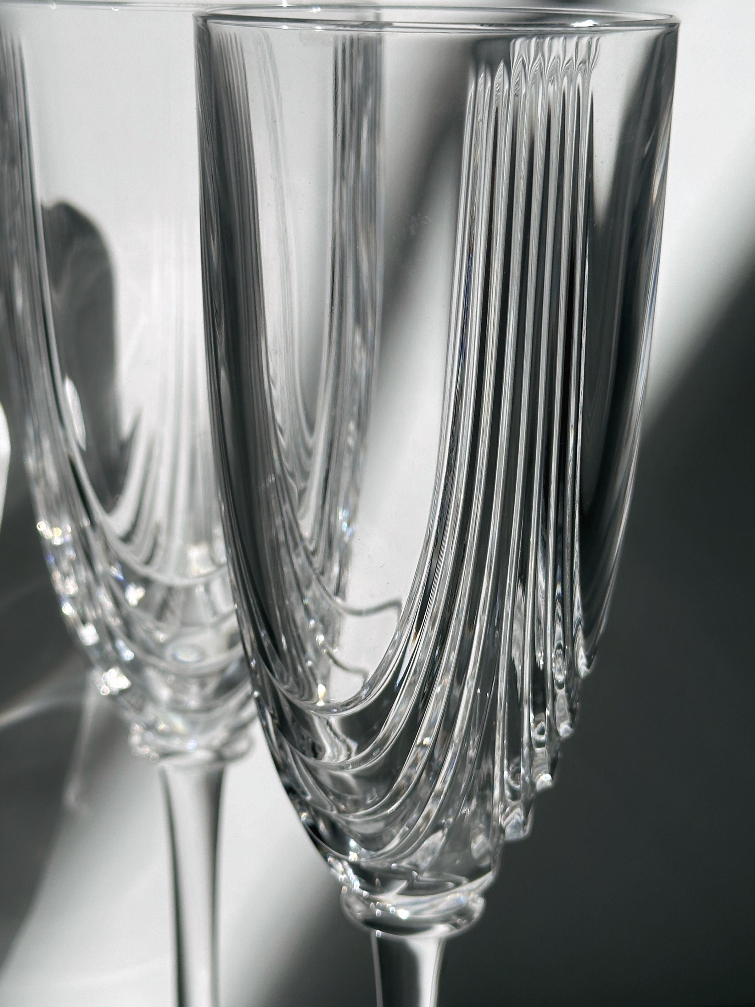2 Italian Art Deco Crystal Glass Sets of 8 and 6 — close-up of ribbed crystal glasses