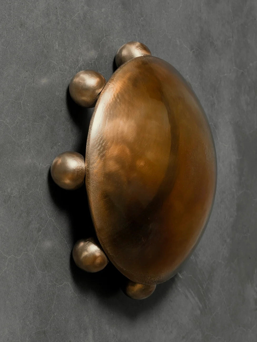 ALTER Sconce | Bronze — side angle showing rounded bronze surface
