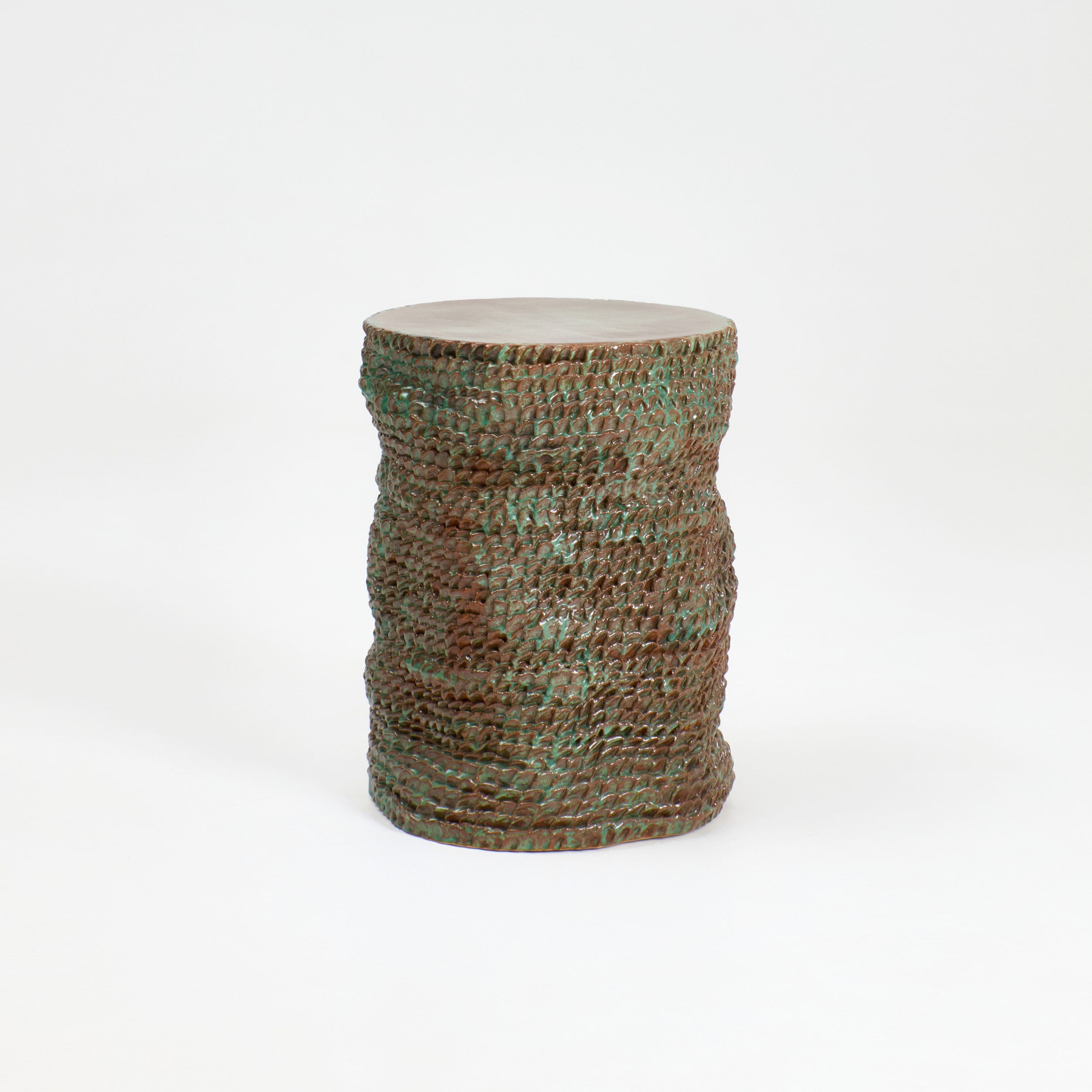 Casa Ceramic Side Table — close-up of textured green ceramic surface