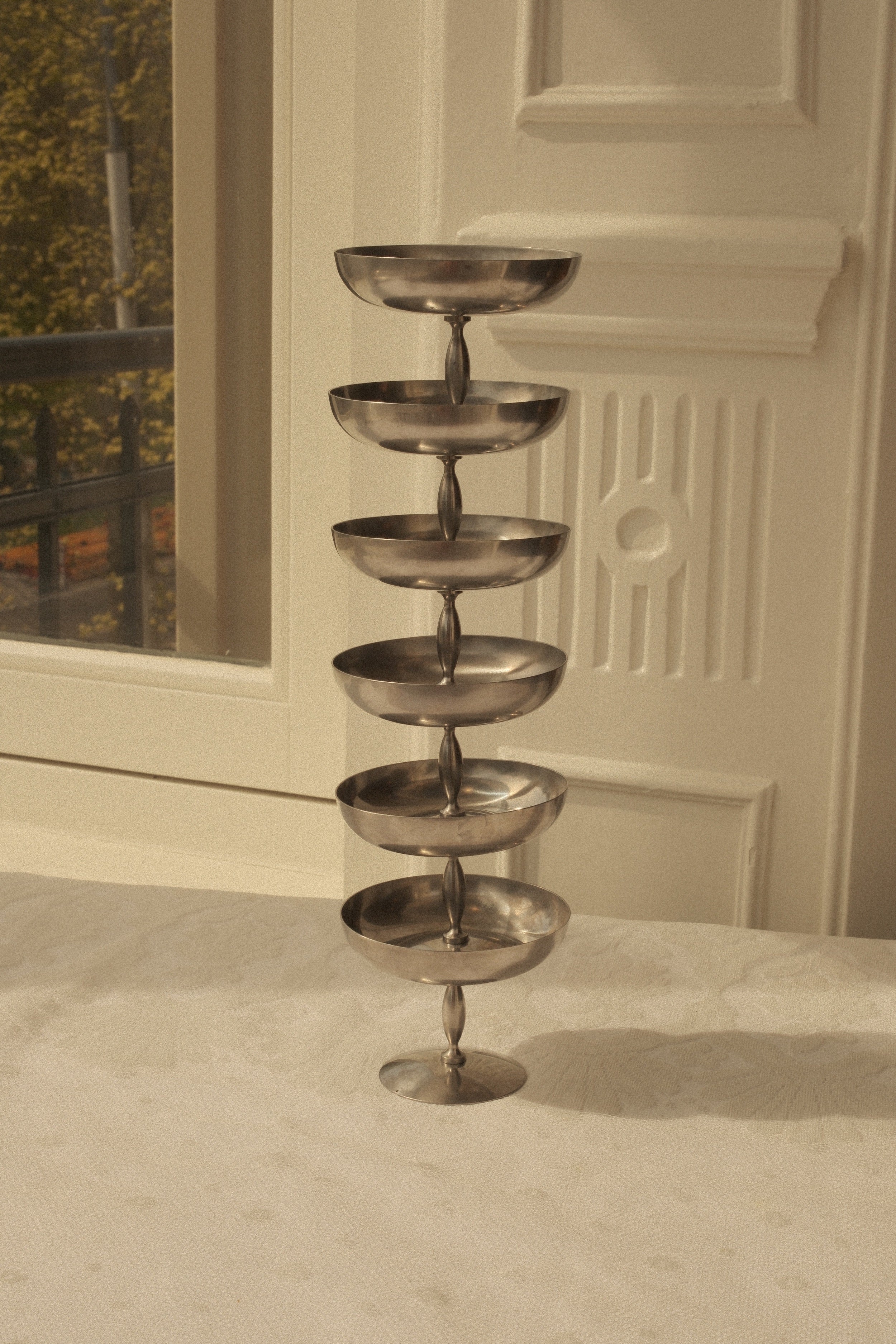Stainless Steel Pedestal Coupes — detail view