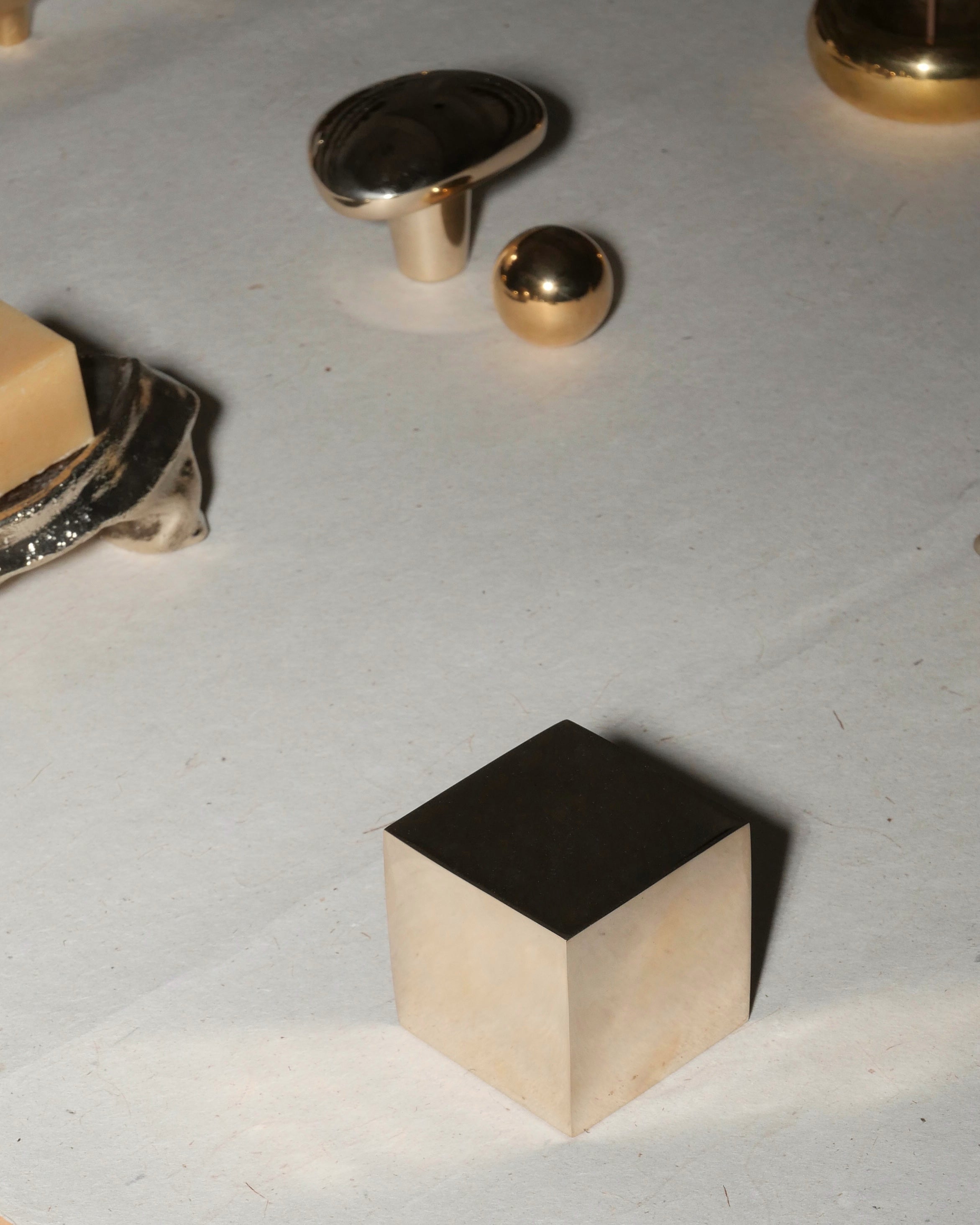 CUBE Cabinet Knob Large — top view of brushed brass finish