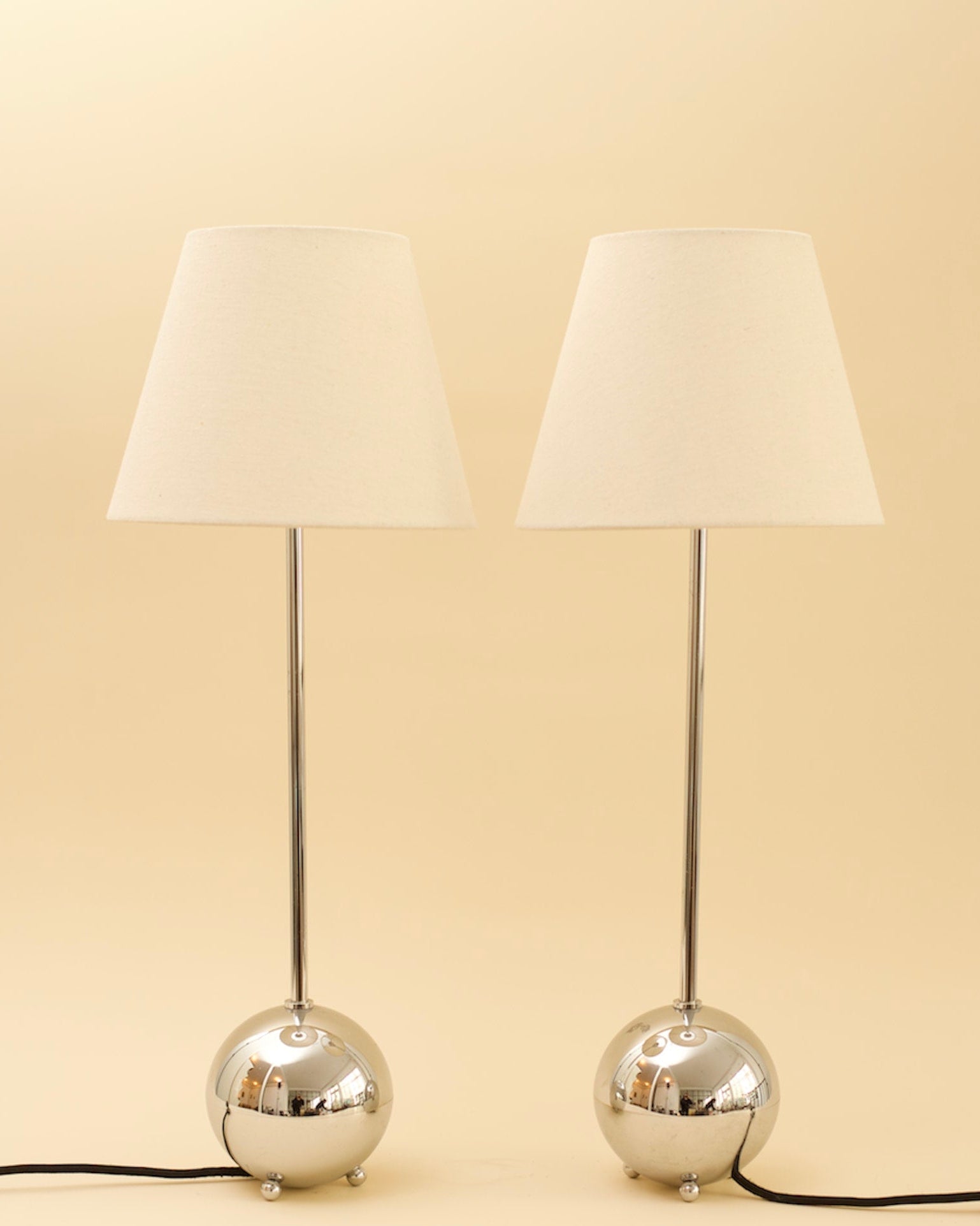 VASSILY — close-up of polished chrome base and fabric shade