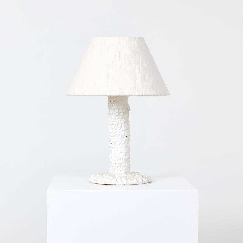 Casa Bedside Light — close-up of textured white ceramic base