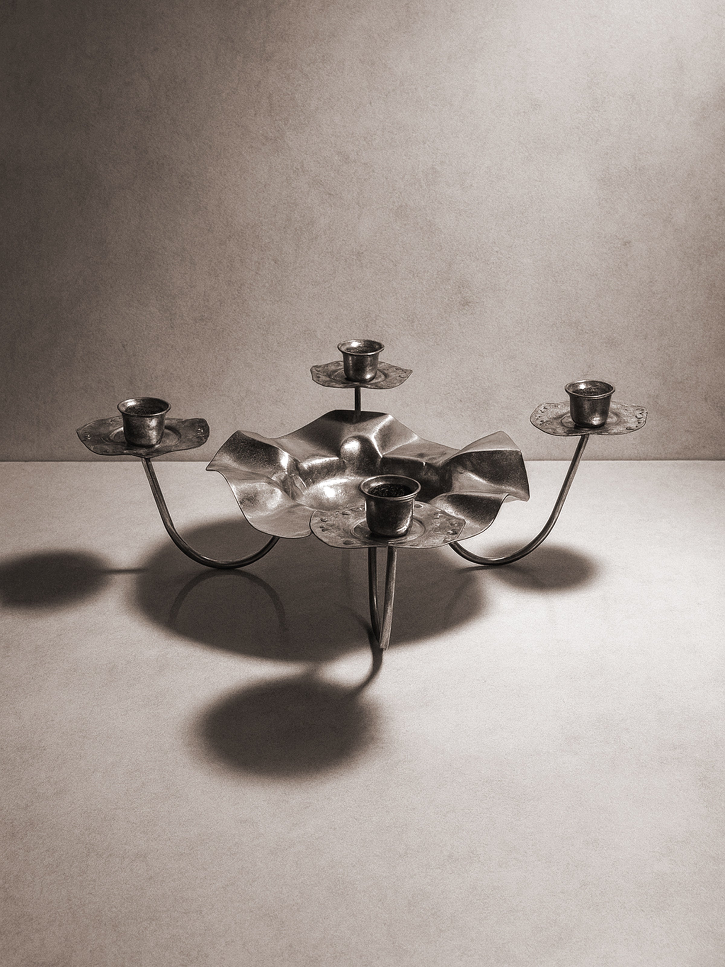 Silver Metal 1960s Candleholder — close-up of flower-shaped design