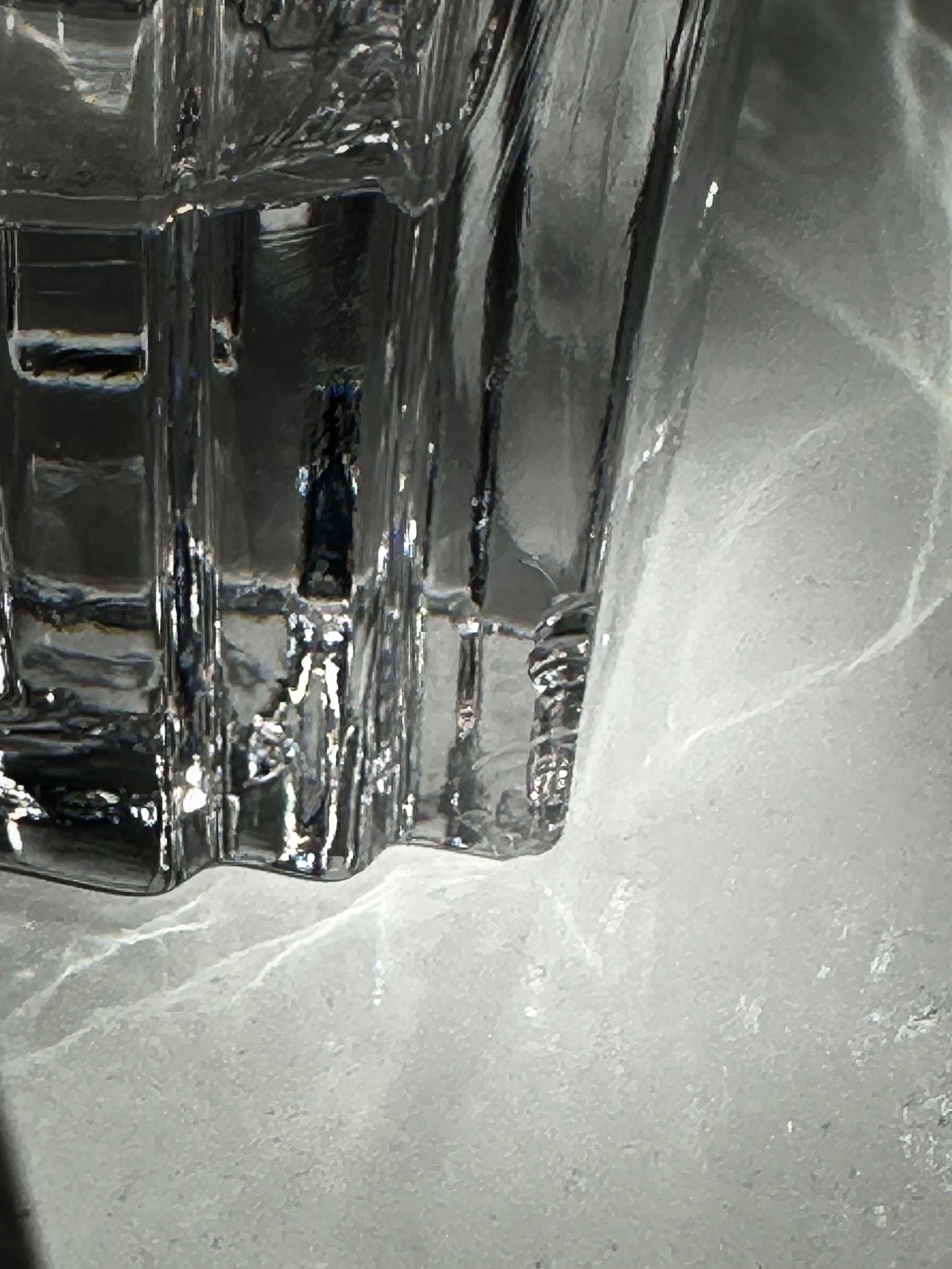 Italian crystal glass Art Deco decanter — close-up of textured surface