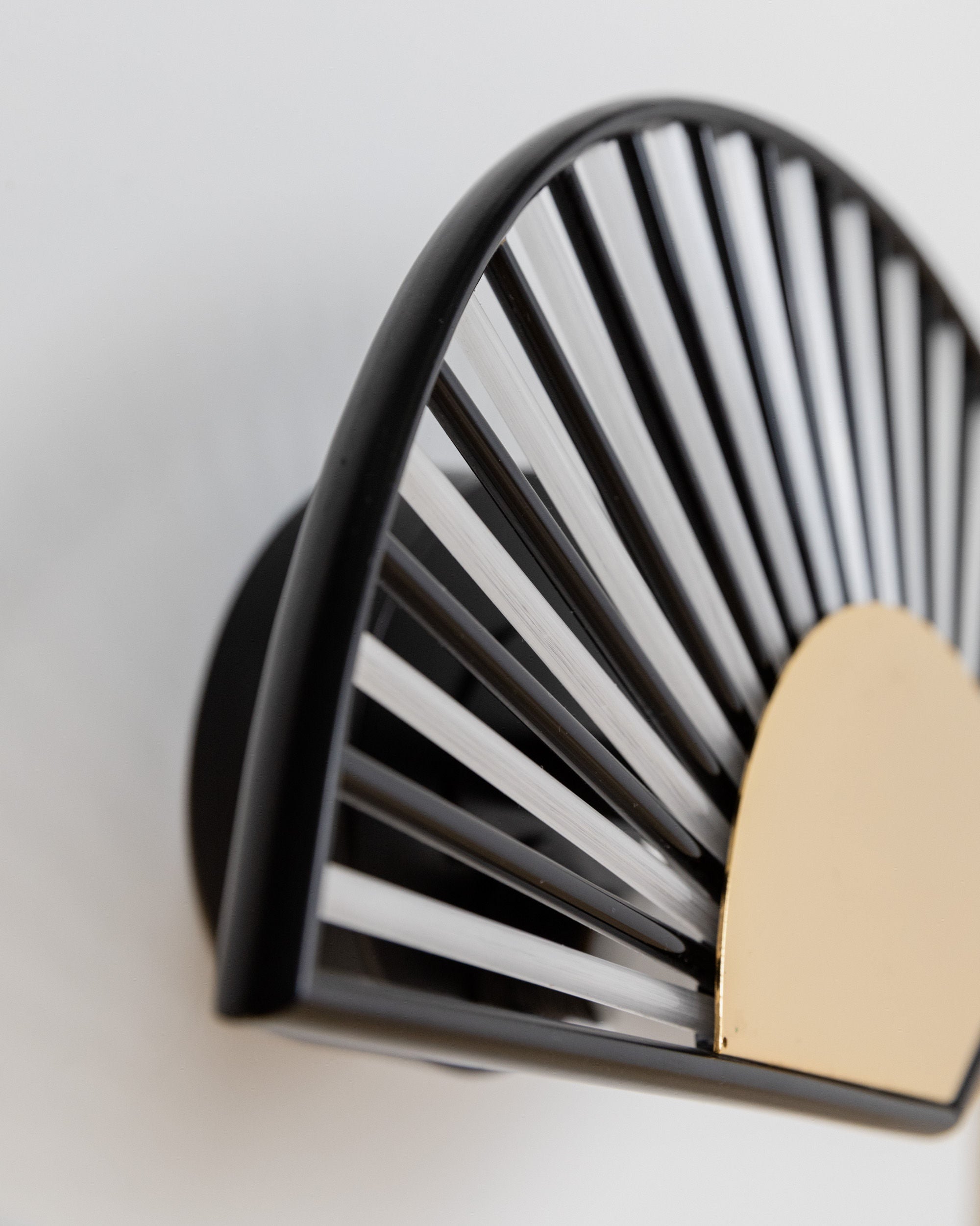 Wall Light Fan Shape, Italy 1980s — angled view showing black and gold design