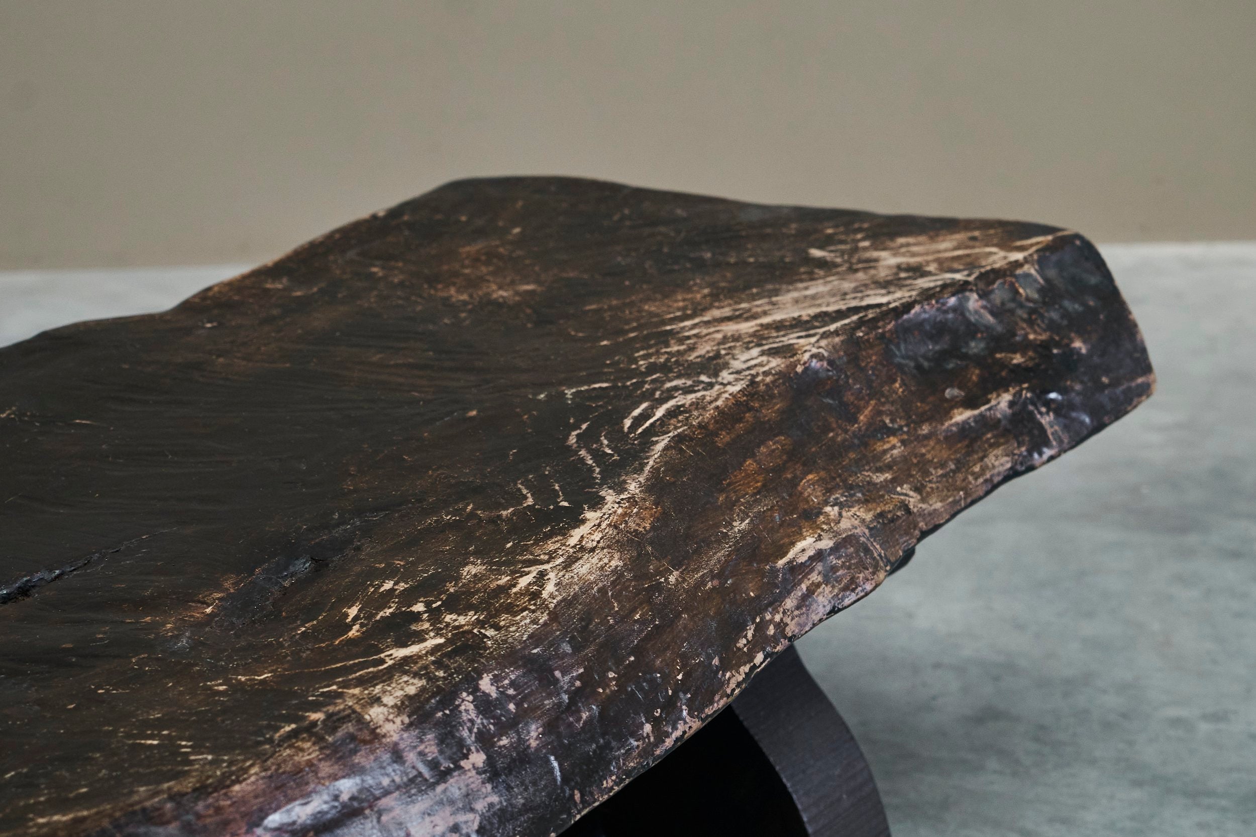 Sculptural Live Edge Coffee Table in Solid Dark Stained Wood — lifestyle setting