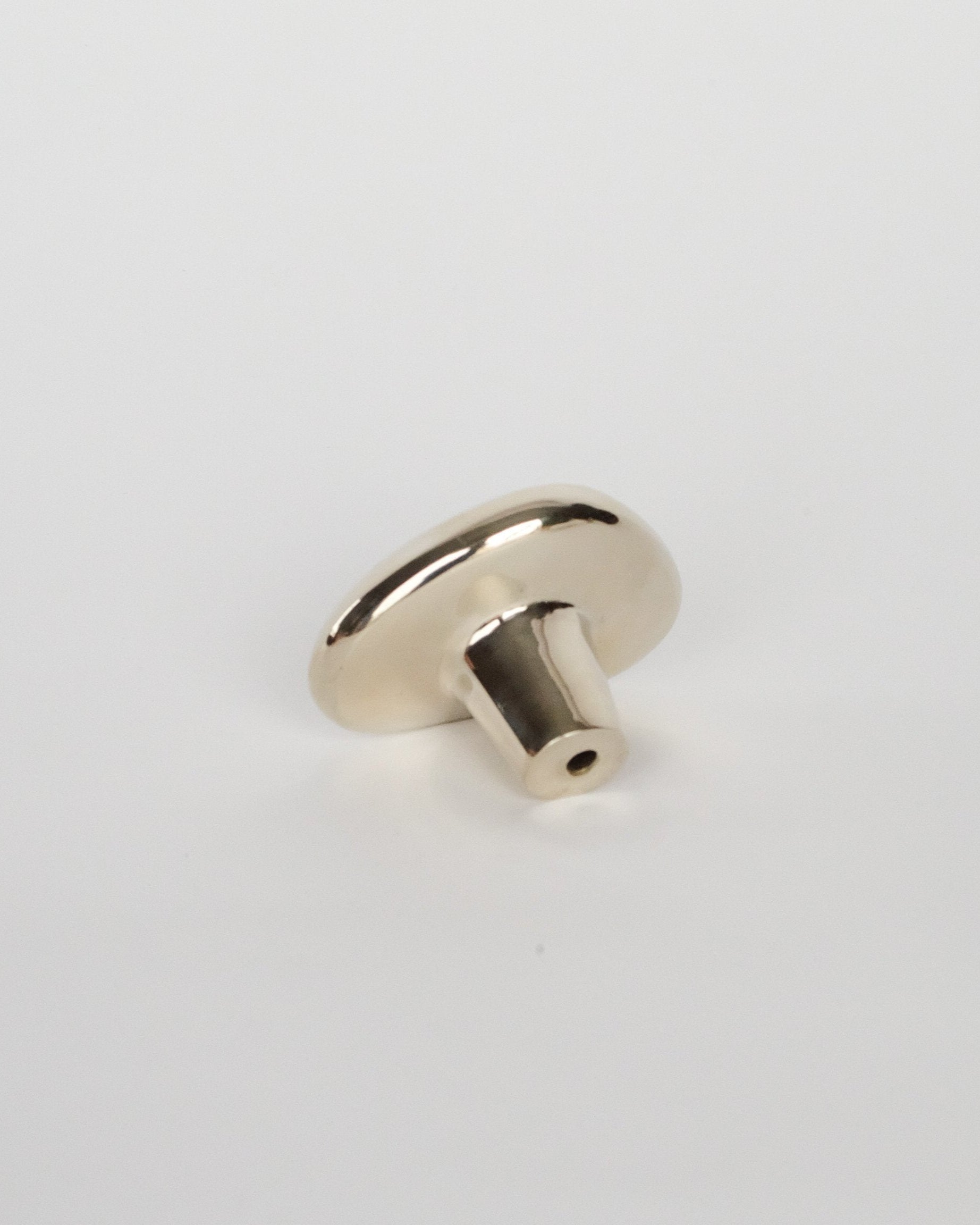 MOMI Cabinet Knob/Wall Hook Short — top view of polished metal finish