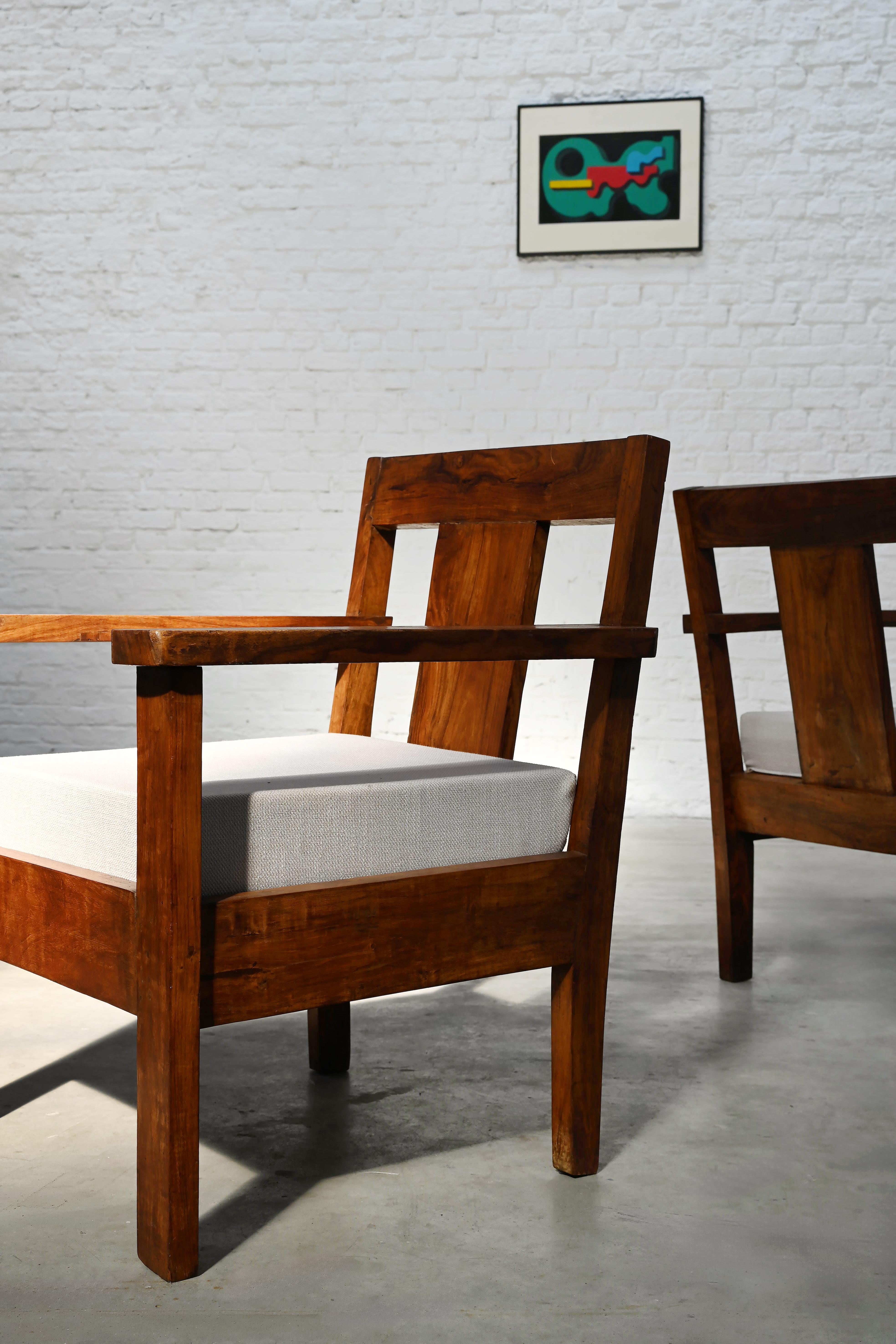 Pair of French Modernist Teak Armchairs, 1960s — lifestyle setting