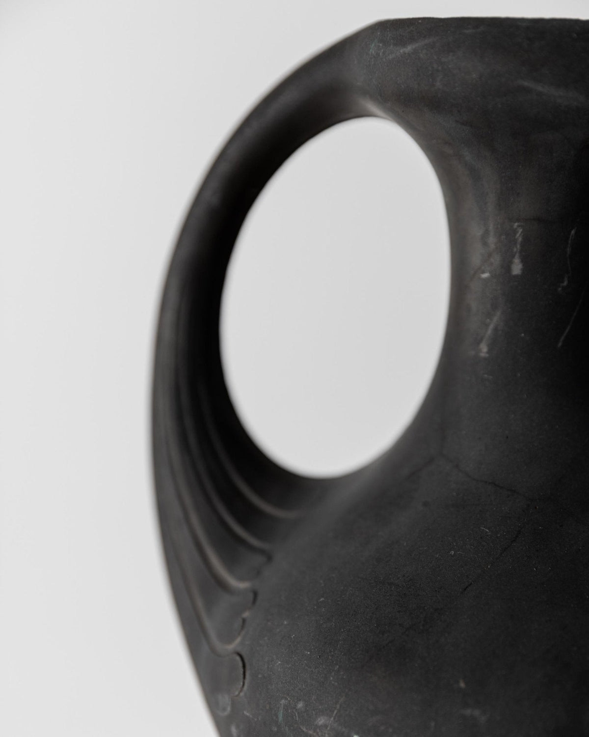 Antique 1920s Lavanite Stone Vase, Sculptural Black Matte Design with Two Handles, Fine Textured Surface, Art Deco Flowervase, Gift Idea — close-up
