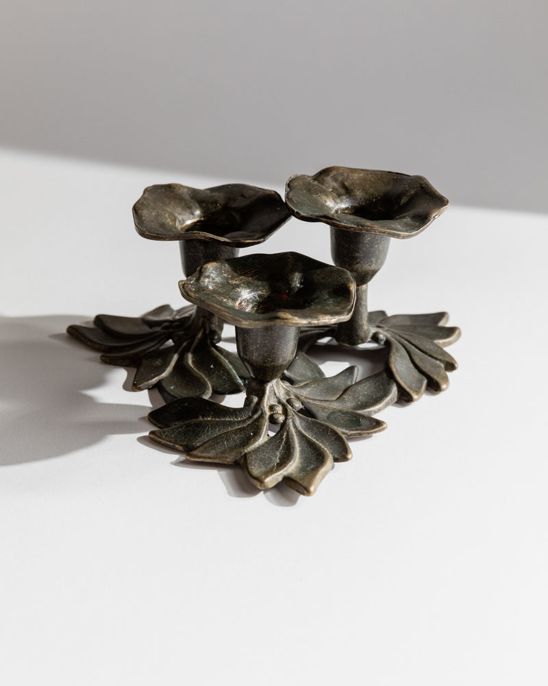 Bronze floral candle holder with three cup details by Christiansen