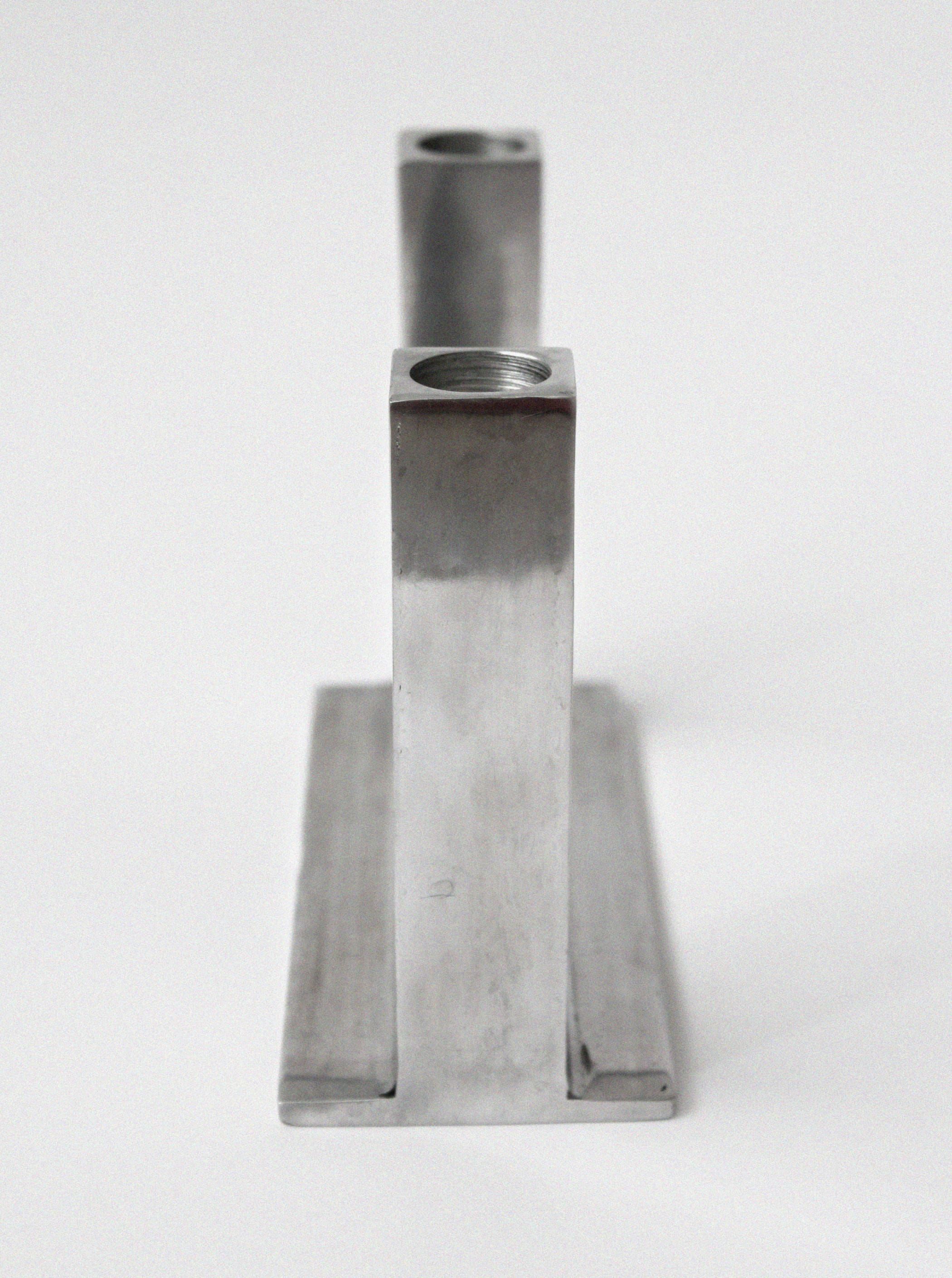 Brutalist aluminum candle holder side profile view