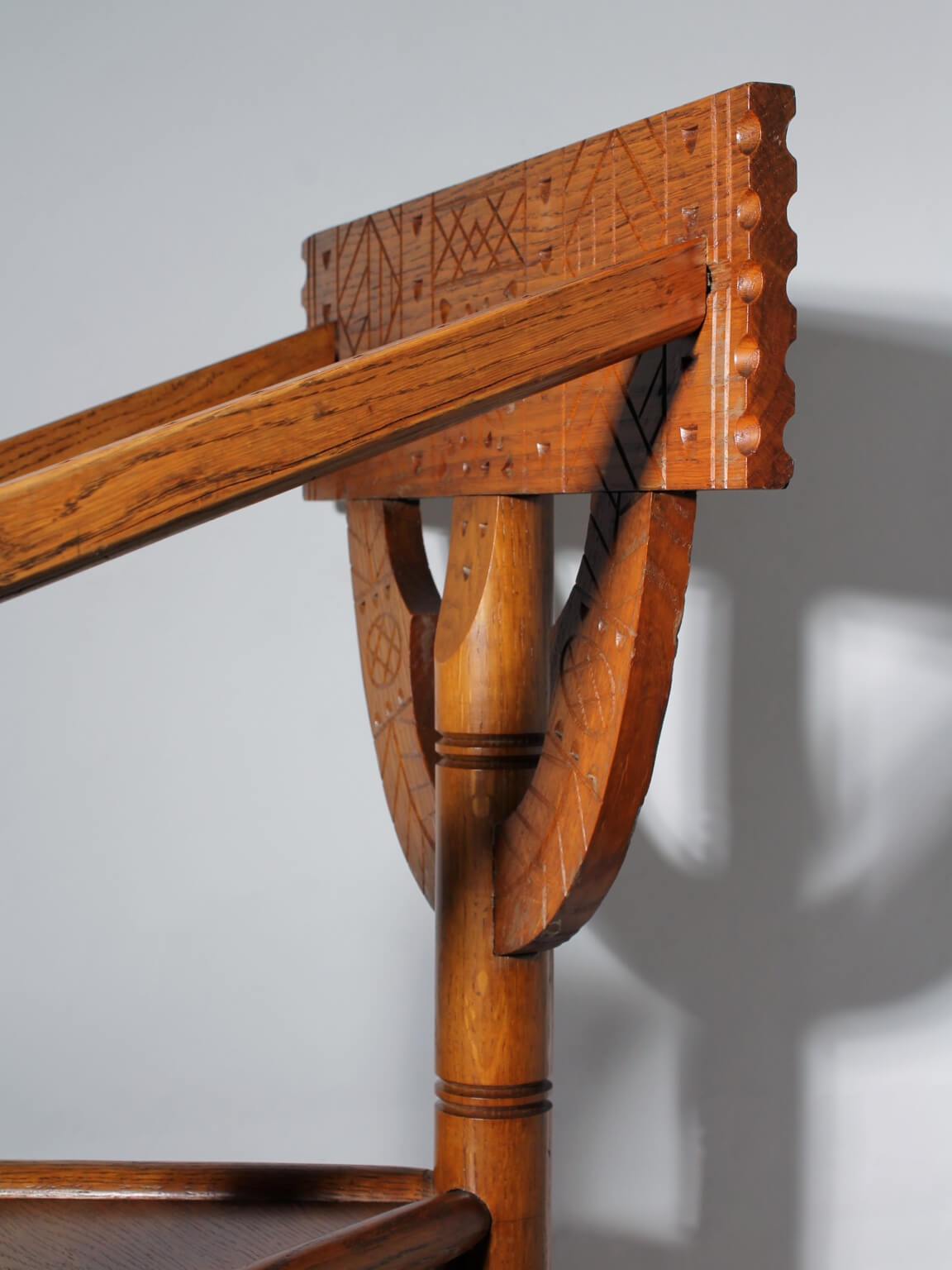 Swedish Carved Oak Monk Chair — side angle showing carved oak details