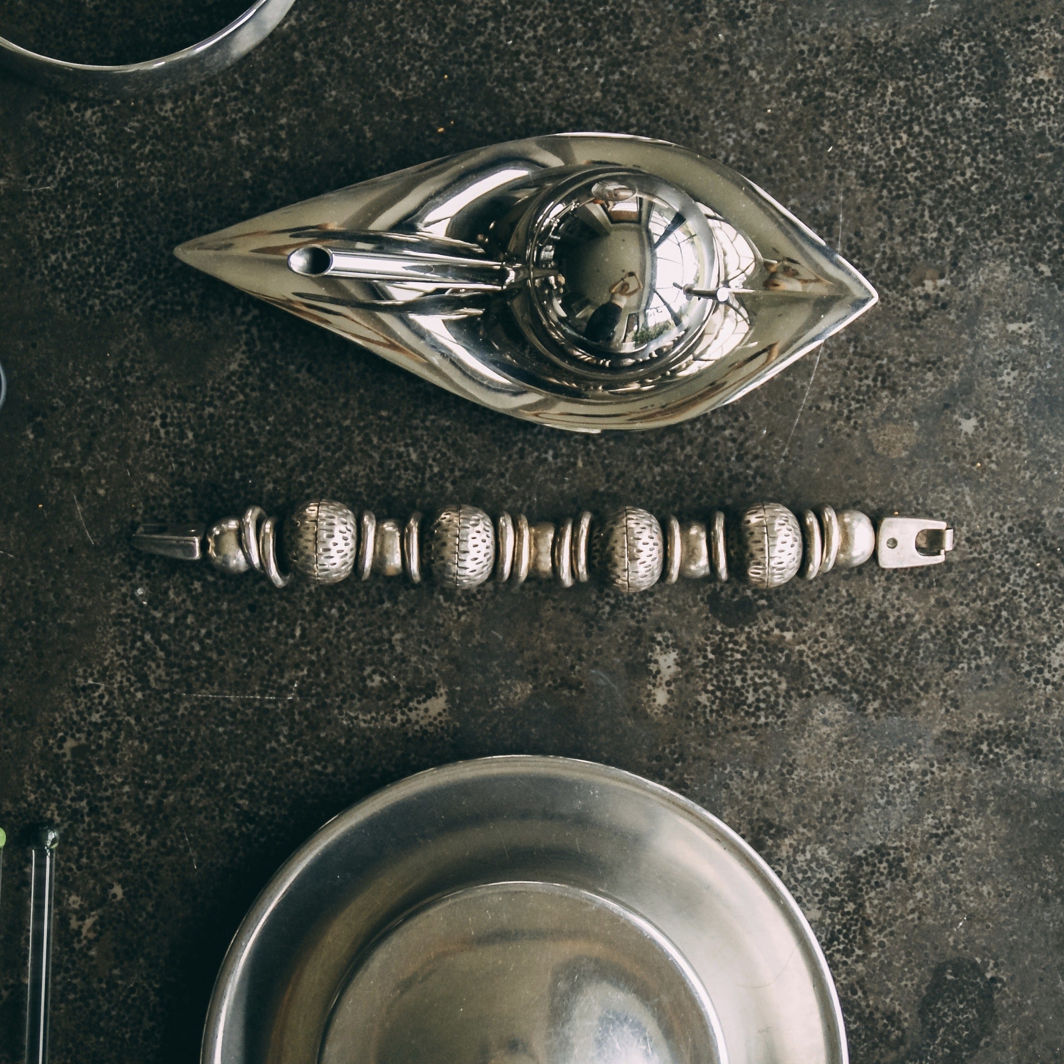 Alessi serveware Oil Dispenser PW01 — in context