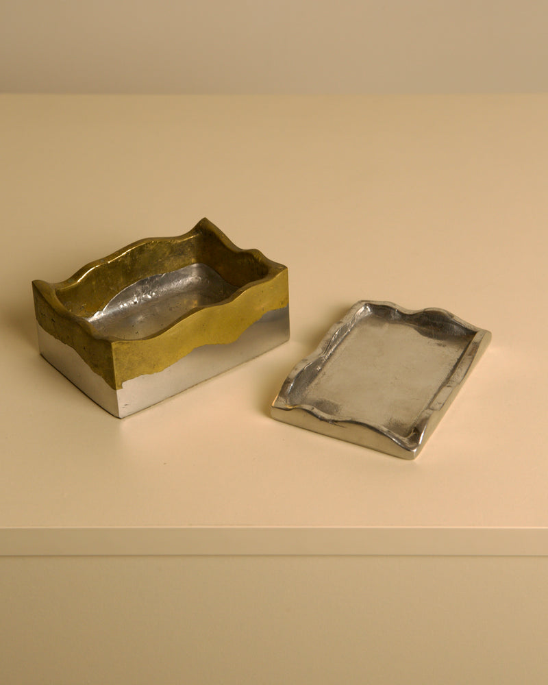Brutalist metal and brass box by David Marshall, 1970s — close-up of wavy brass and silver surfaces