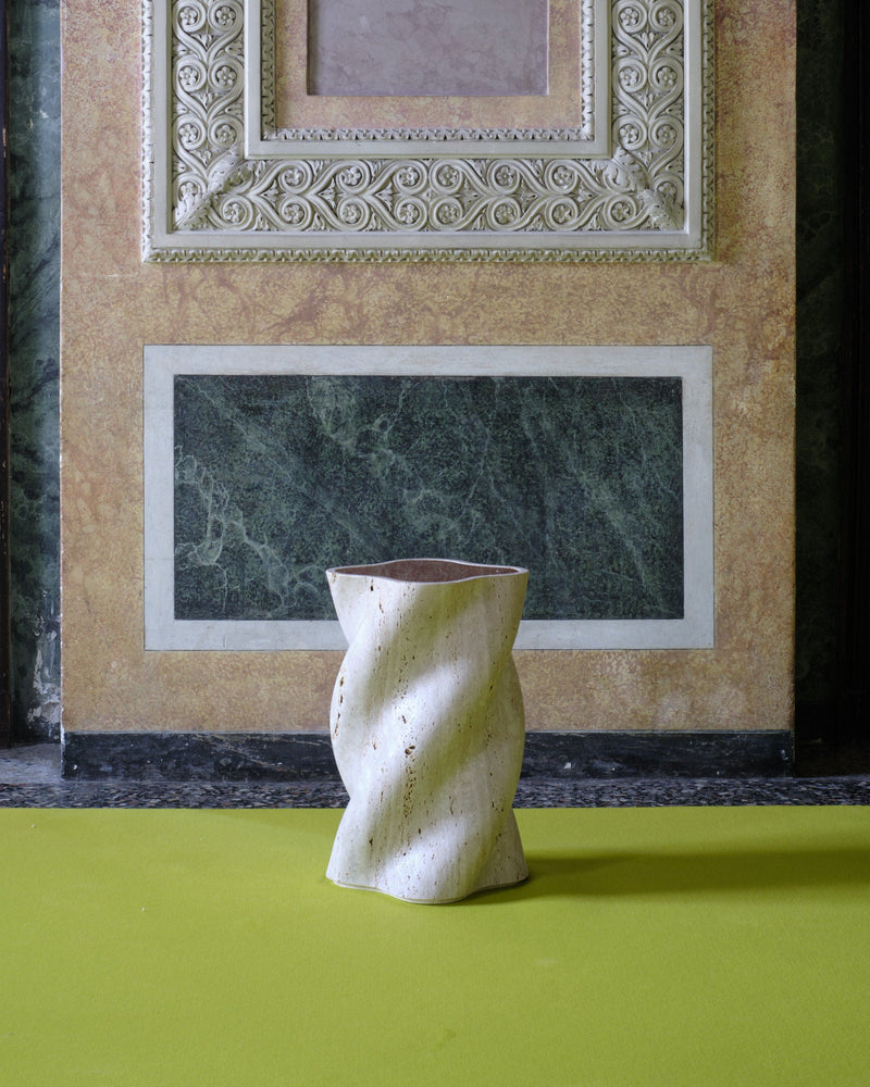 fUUUUsillo Travertine End Table — close-up of textured travertine surface