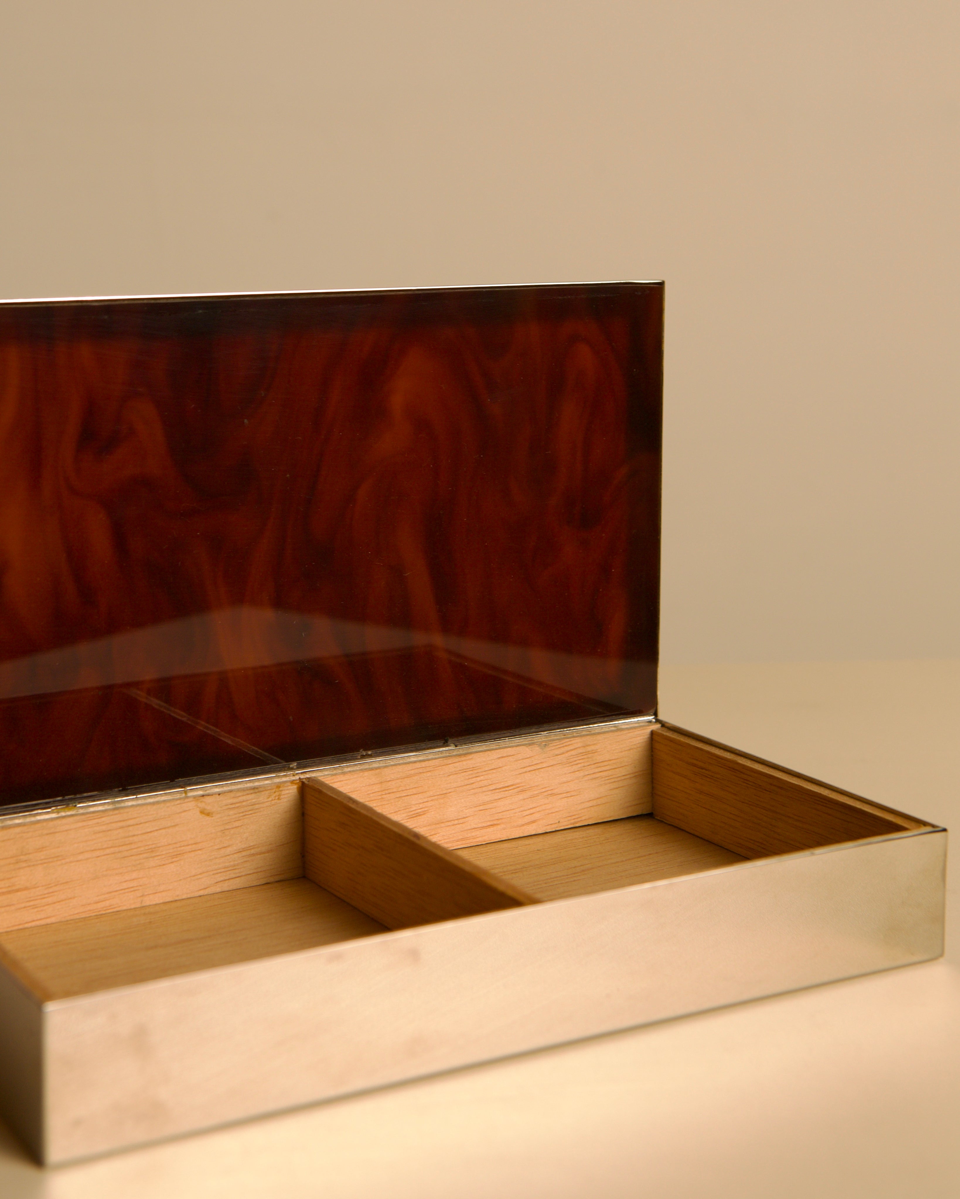 Italian rectangular box in chrome metal and faux tortoiseshell lacquer with light wood int — lifestyle setting