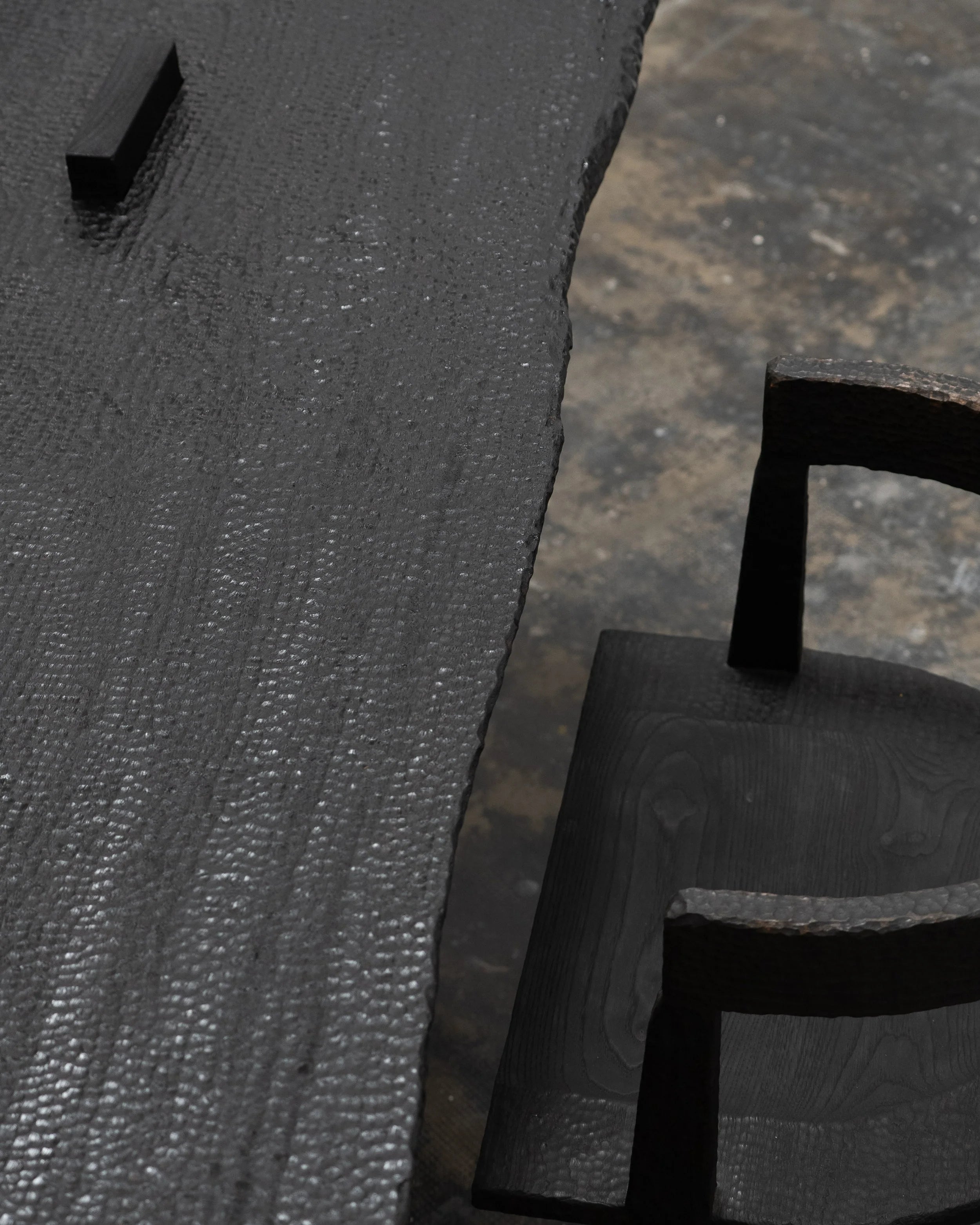 Massif Dining Table from Charred Eucalyptus Wood — close-up