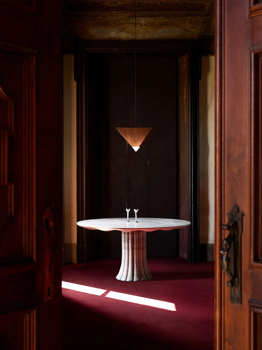 Drapery Table in Silver Travertine — close-up