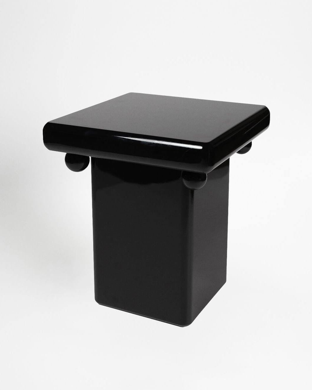 Stool - Bench in Black Laquer — front view in minimalist setting