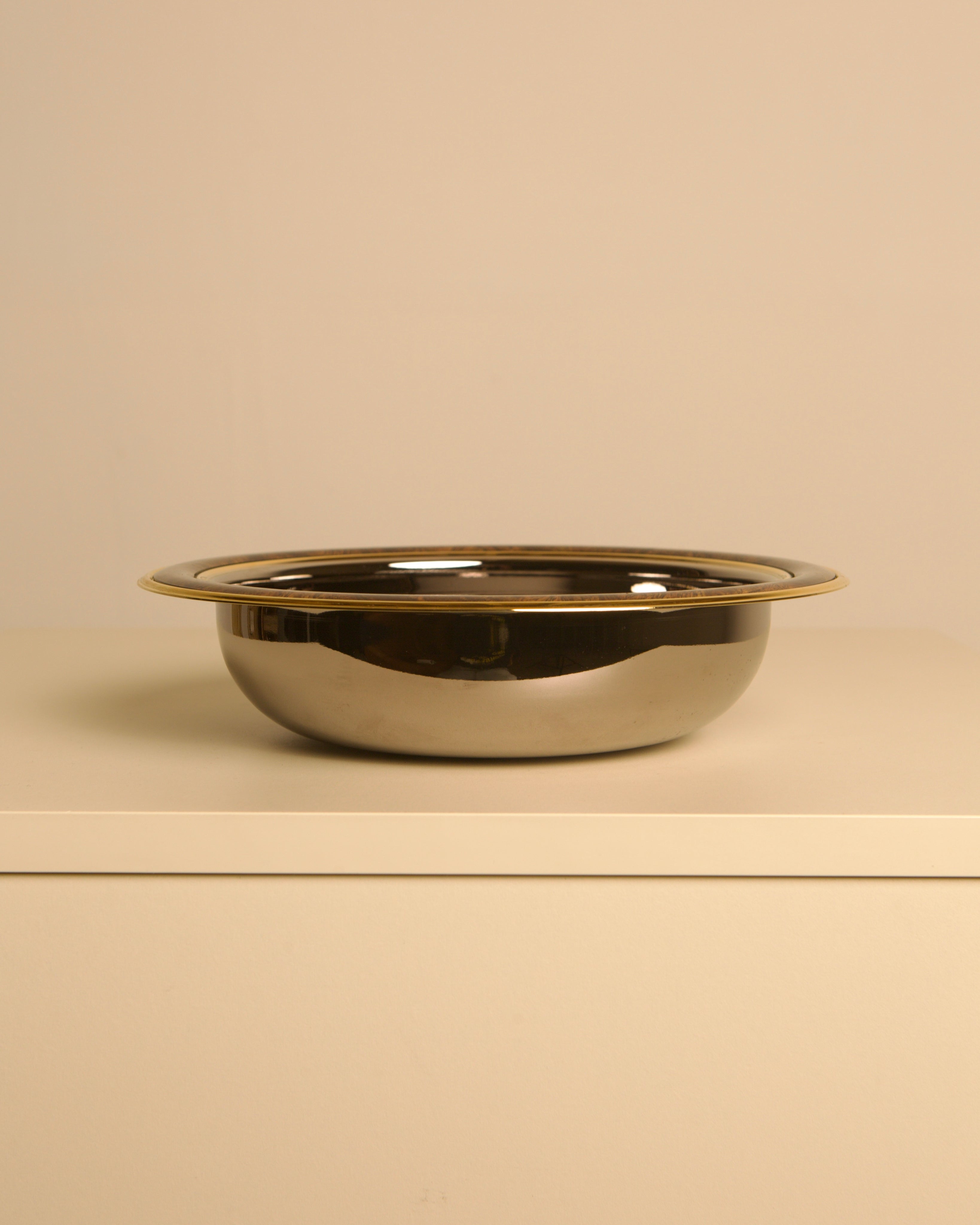 Italian circular silver-plated and wood-effect metal vide-poche from the 70s — side angle