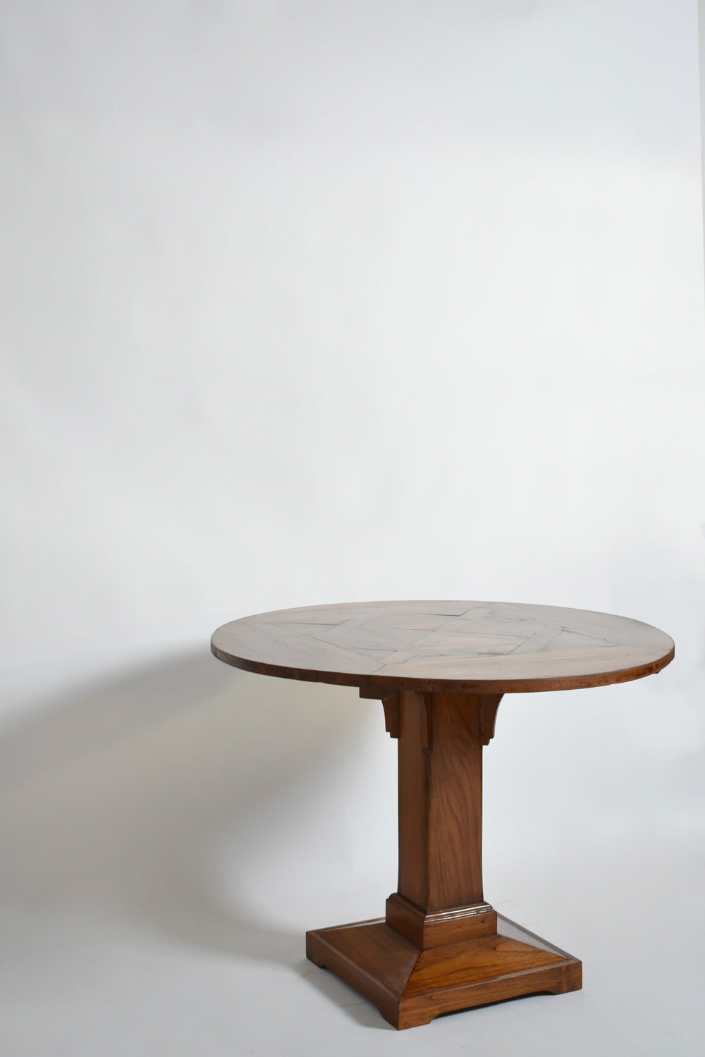 Round Amsterdam School Pedestal Table, 1920s — side view in minimalist setting